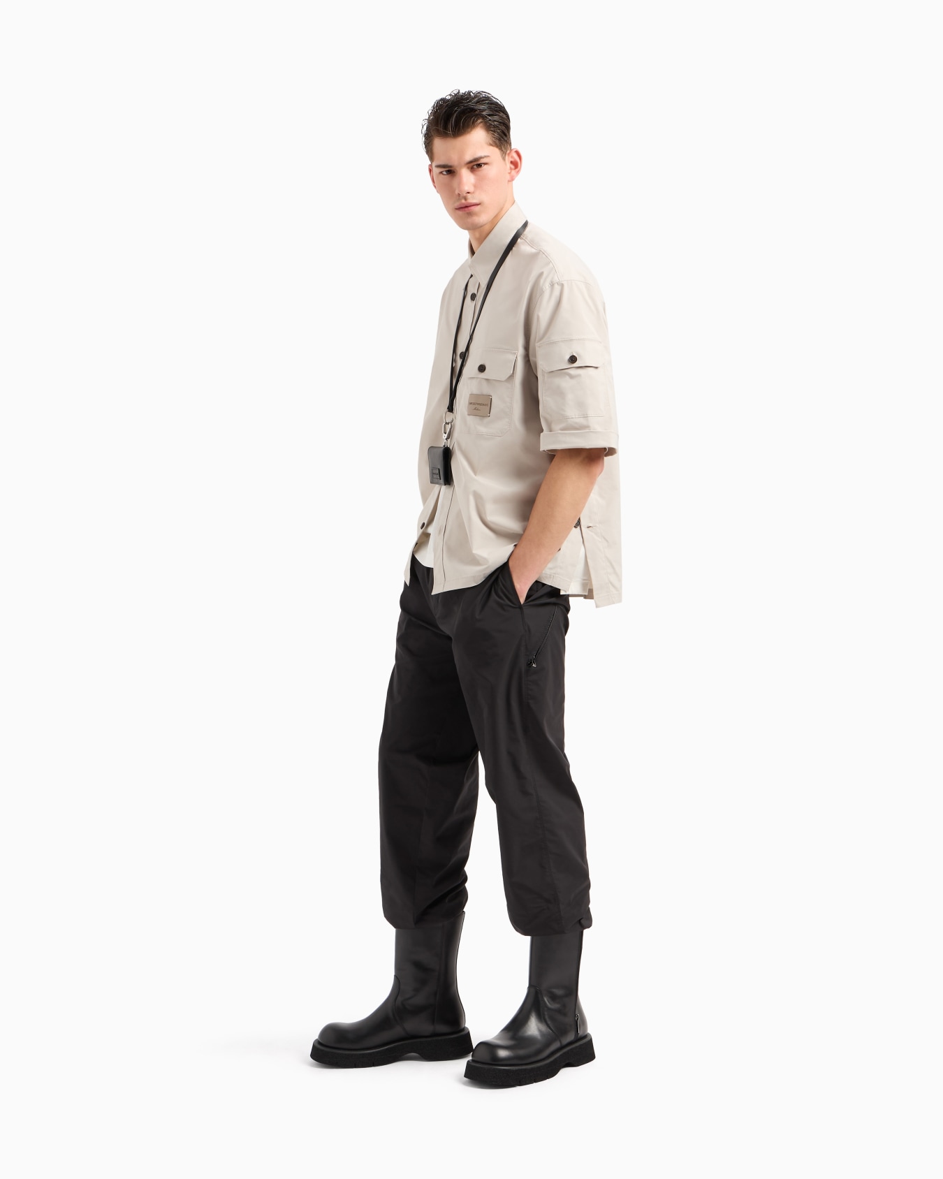 Technical fabric trousers with zip pocket Slide 2