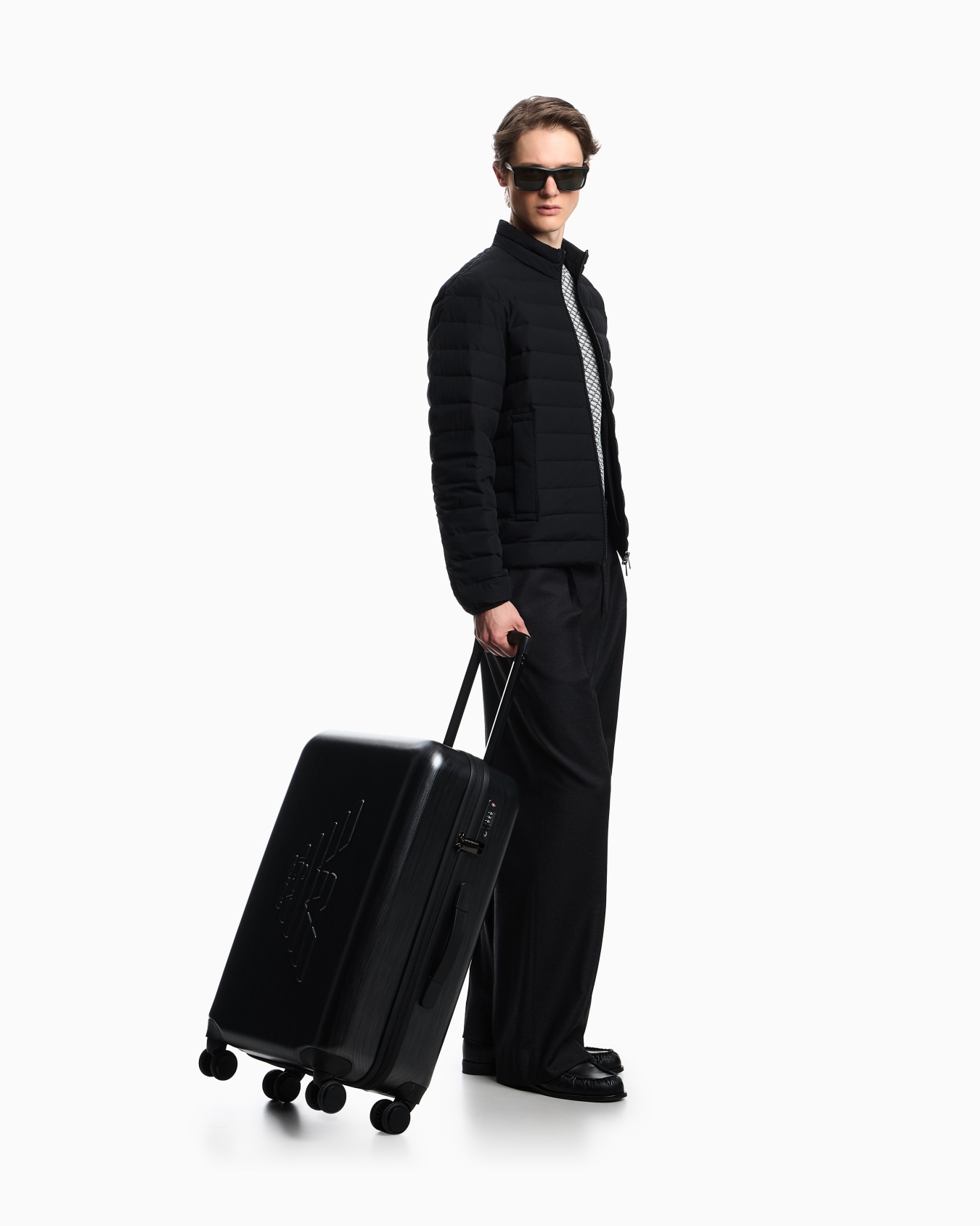 ABS medium trolley suitcase with oversized, embossed eagle Slide 6