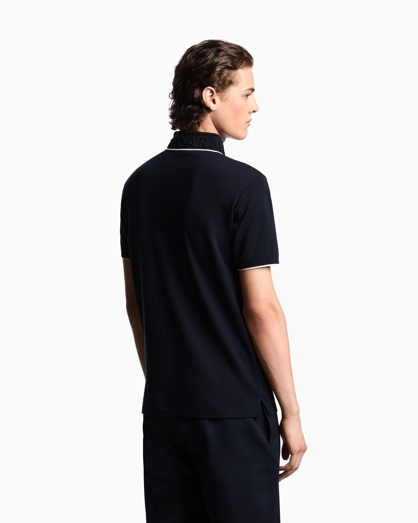 Piqué polo shirt with embossed logo collar Slide 2