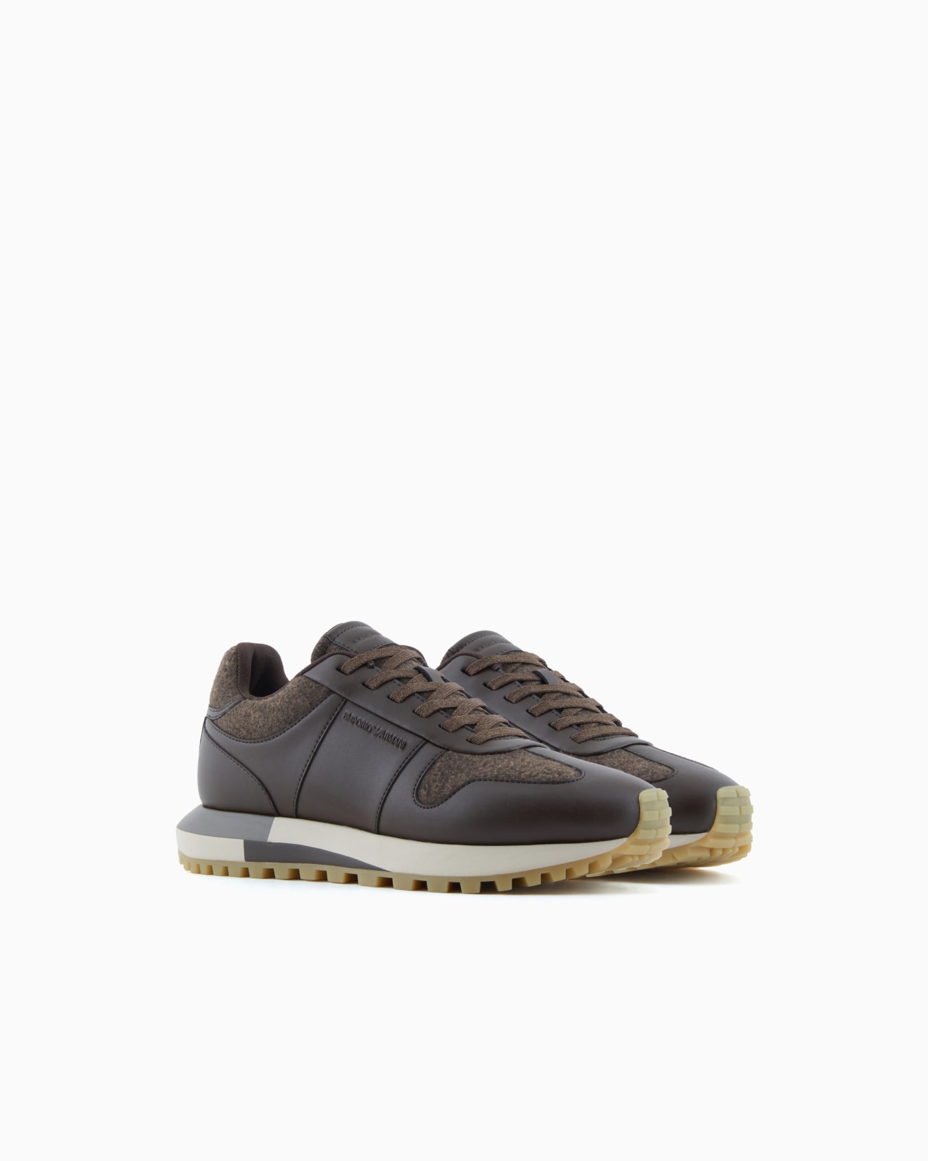 Leather sneakers with felt details Slide 1