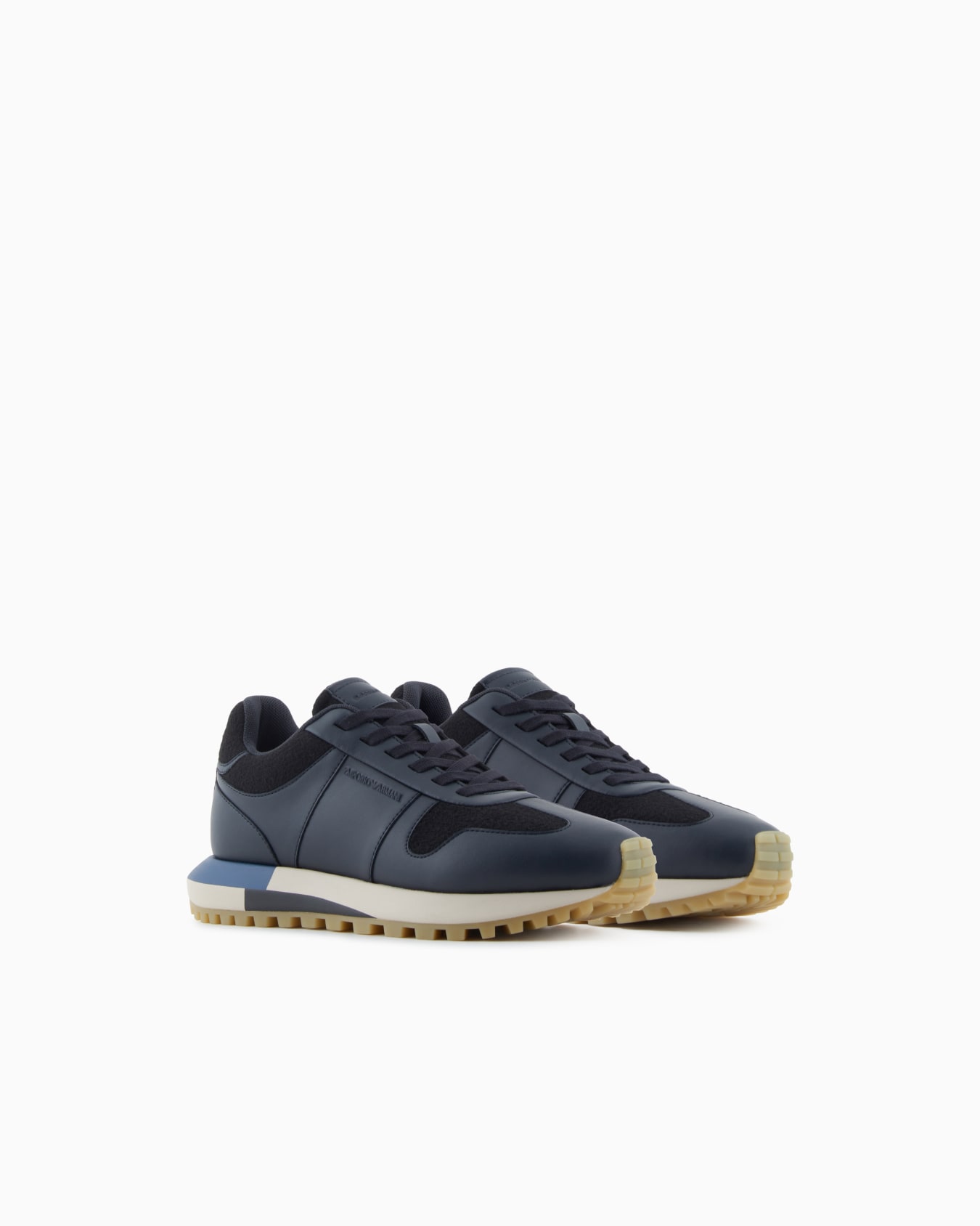 Leather sneakers with felt details Slide 1