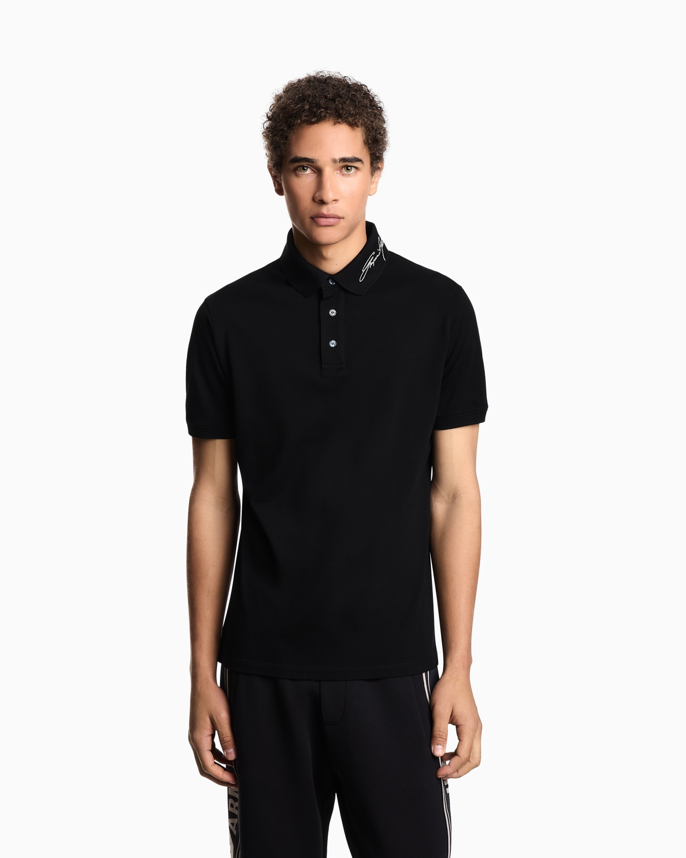 Piqué polo shirt with signature logo embroidery on the collar Slide 4