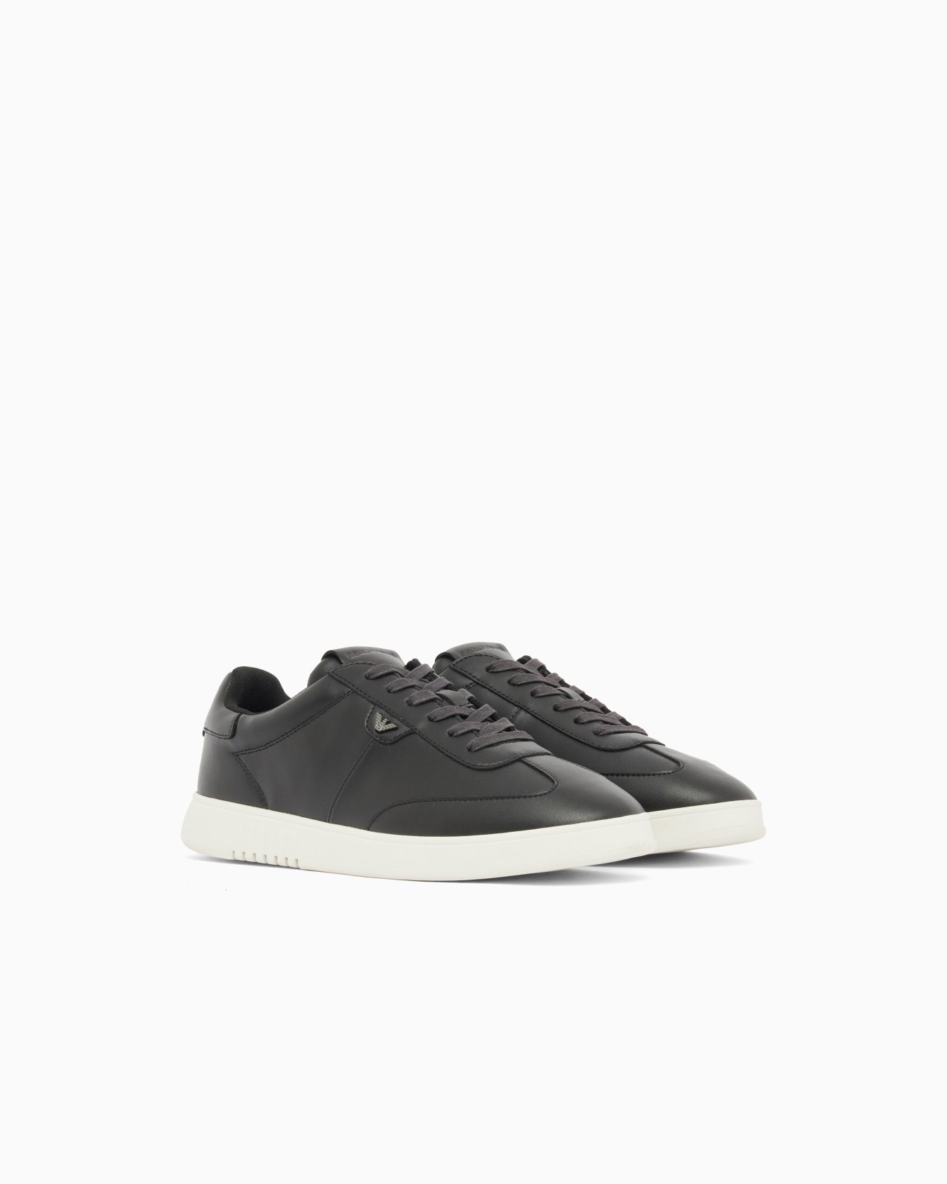 Leather sneakers with eagle plate Slide 1