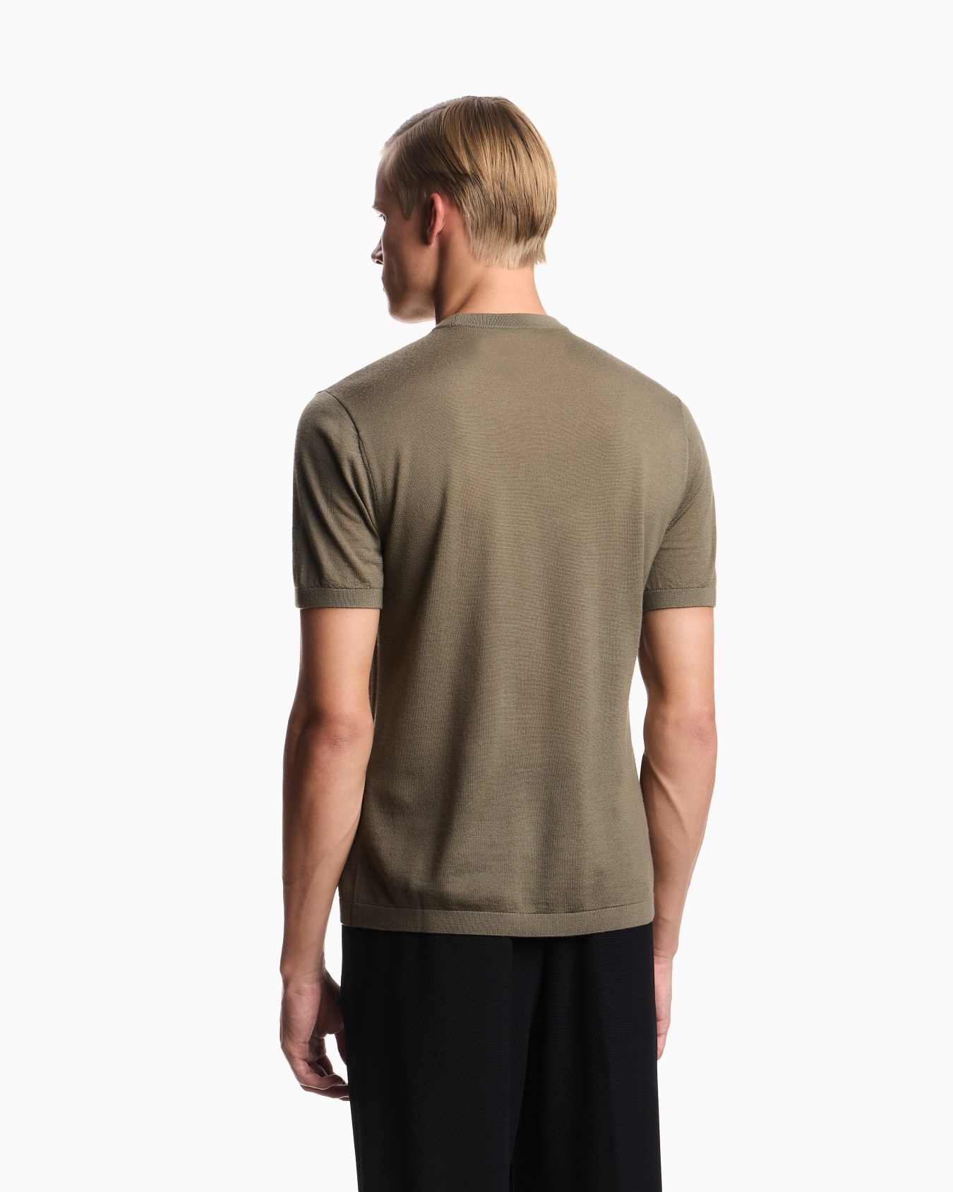 Short-sleeved jumper in a seamless plain-knit virgin wool Slide 2
