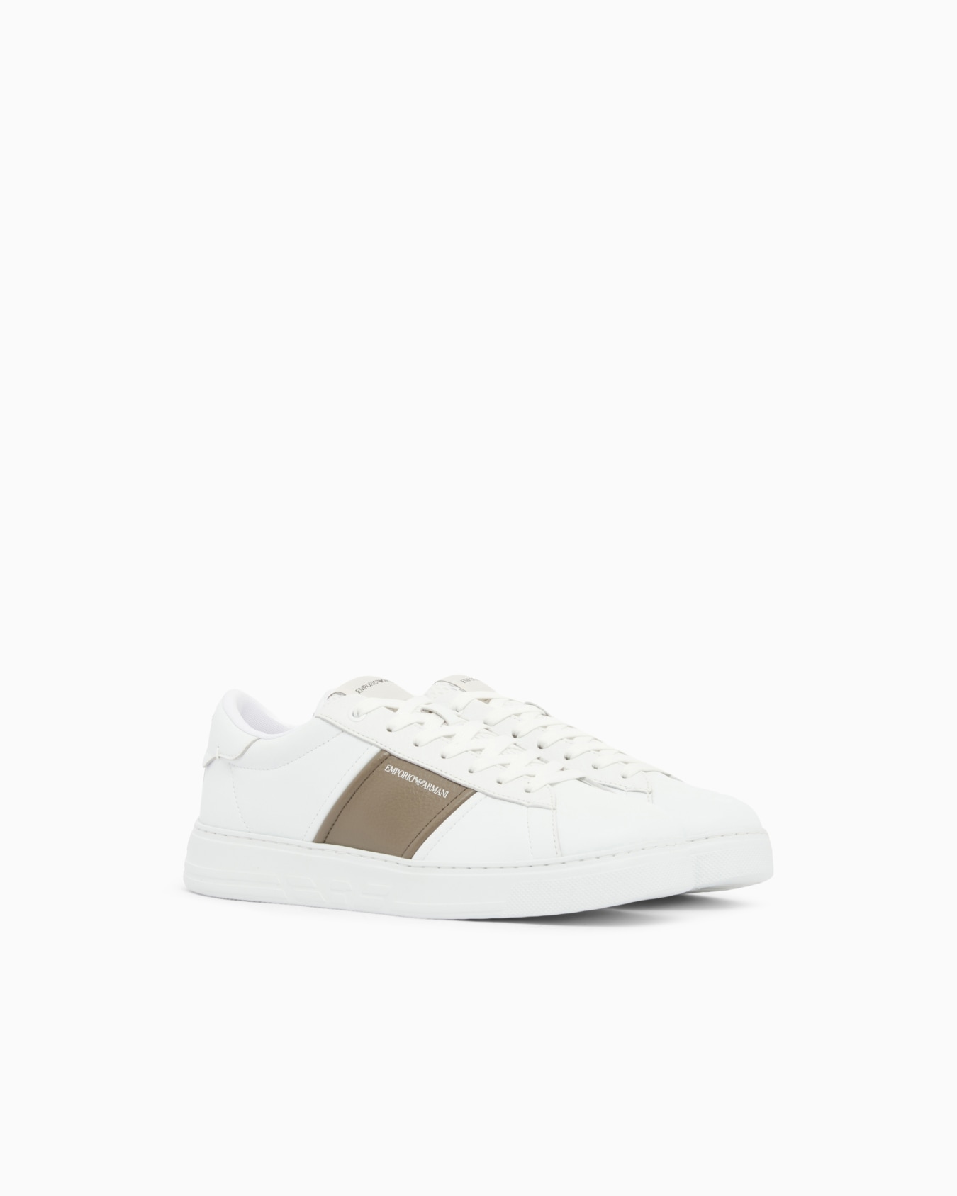 Leather sneakers with an embossed logo and contrasting panel Slide 1
