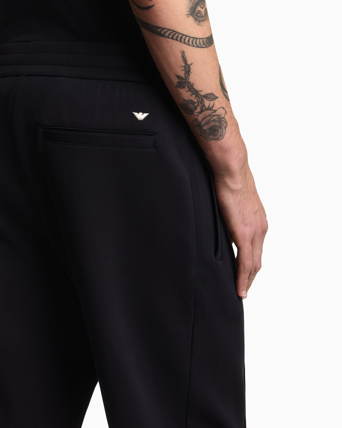 Double-jersey joggers with embroidered micro eagle Slide 4