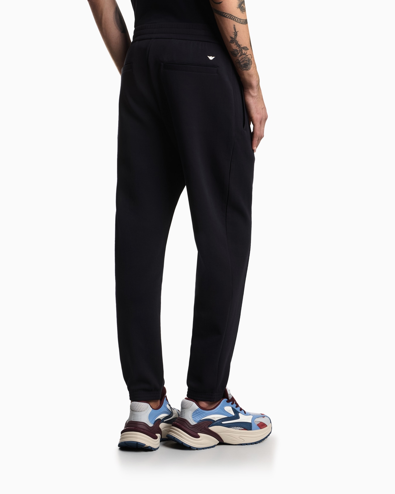 Double-jersey joggers with embroidered micro eagle Slide 5