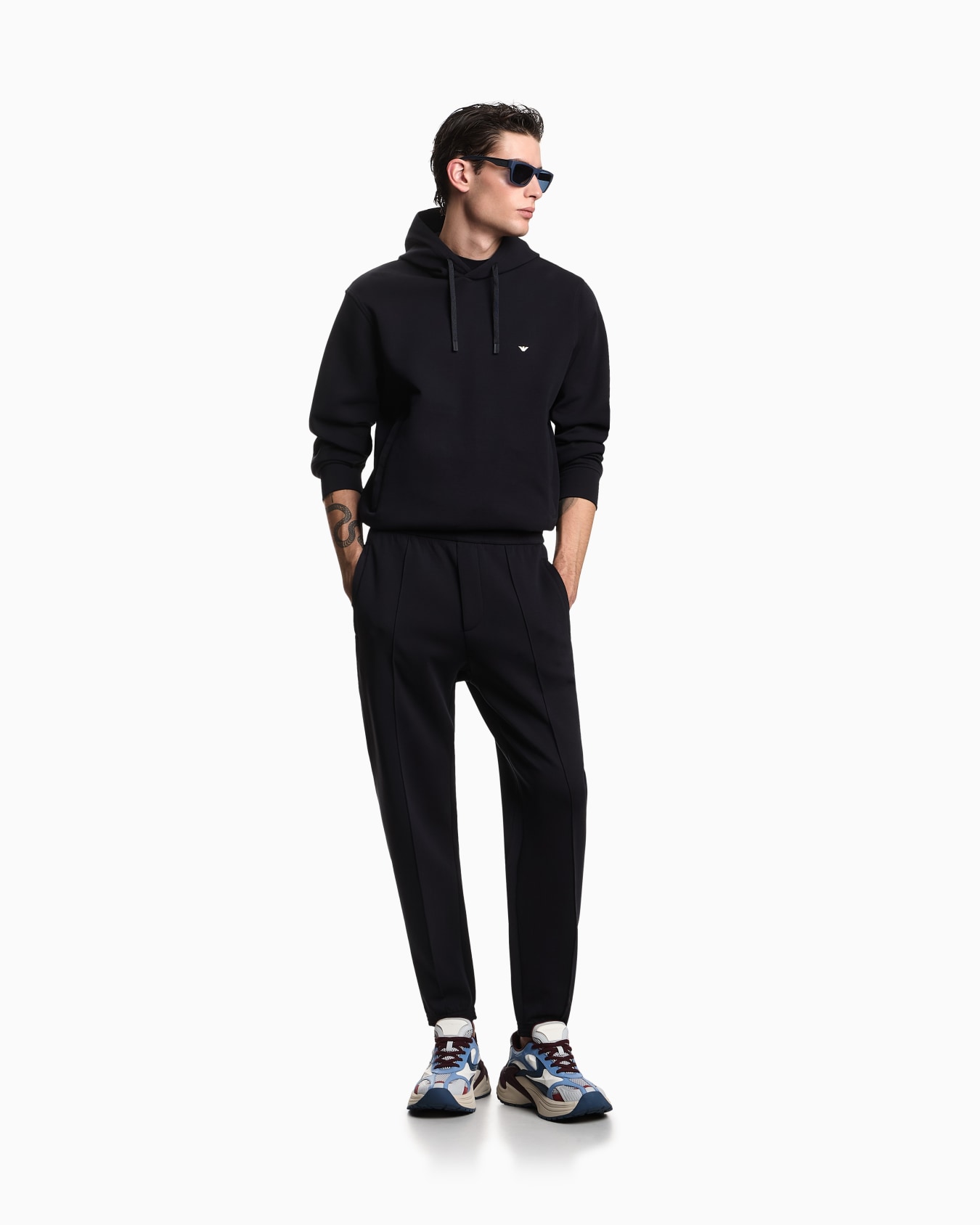 Double-jersey joggers with embroidered micro eagle Slide 1