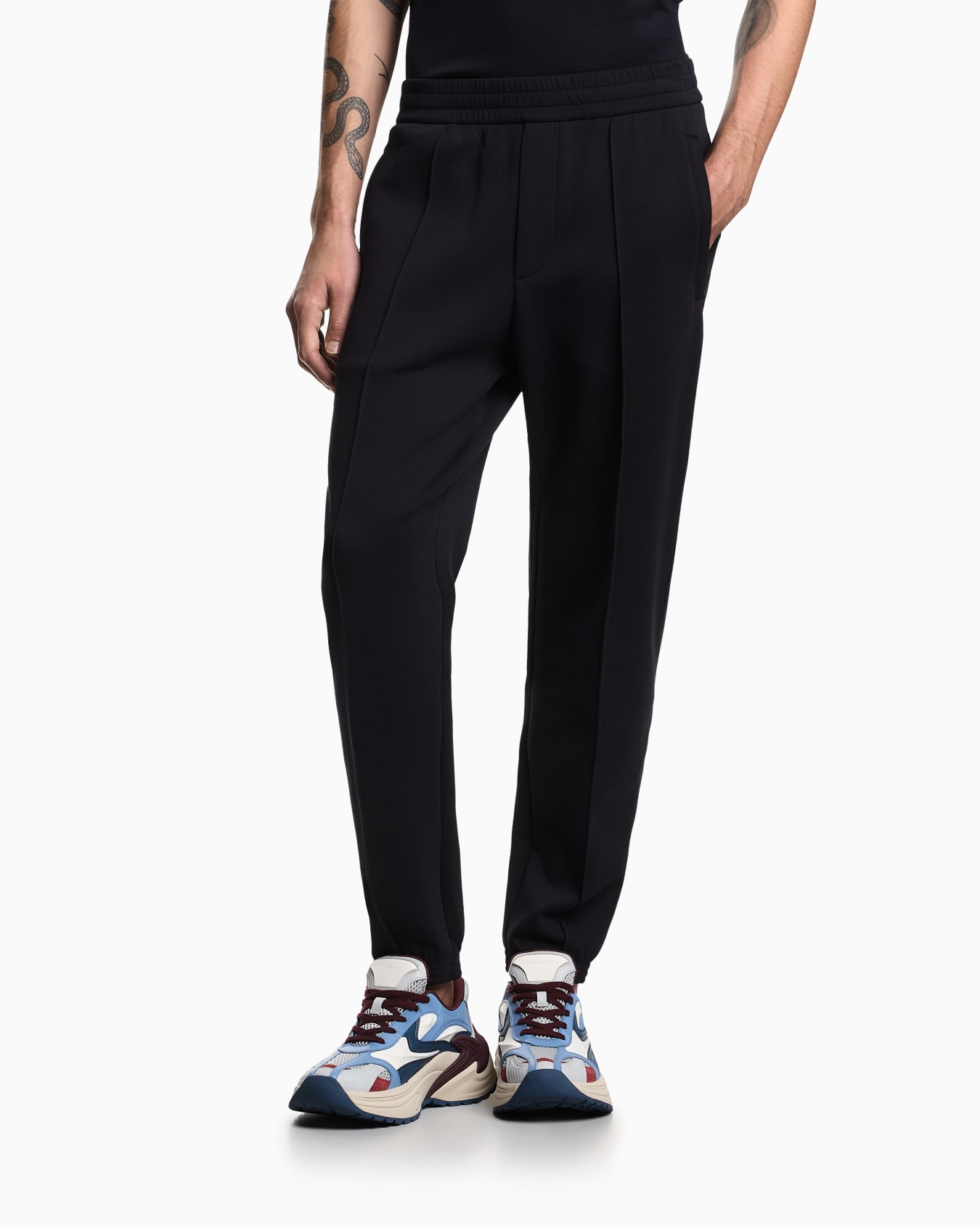 Double-jersey joggers with embroidered micro eagle Slide 3