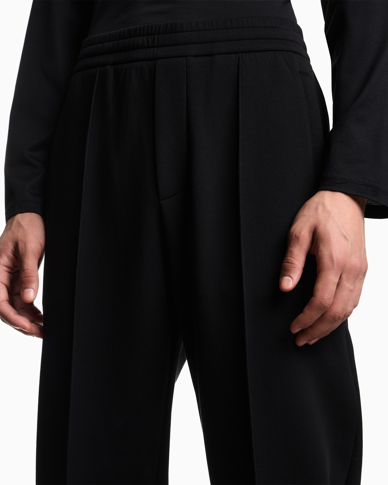 Double-jersey joggers with embroidered micro eagle Slide 4