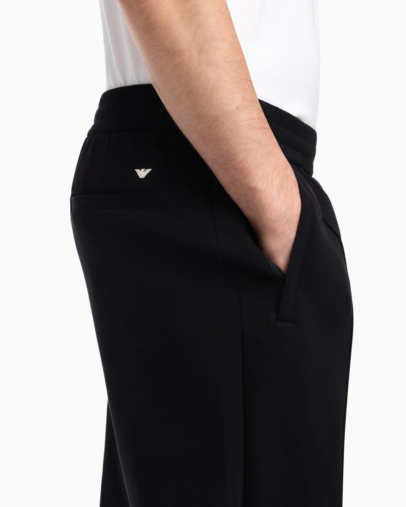 Double-jersey joggers with embroidered micro eagle Slide 7