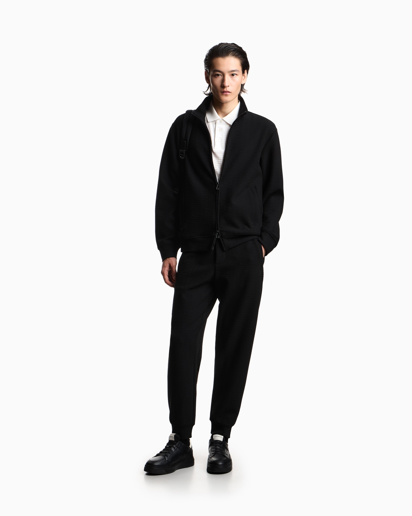 Jersey polo shirt with all-over jacquard lettering Slide 1