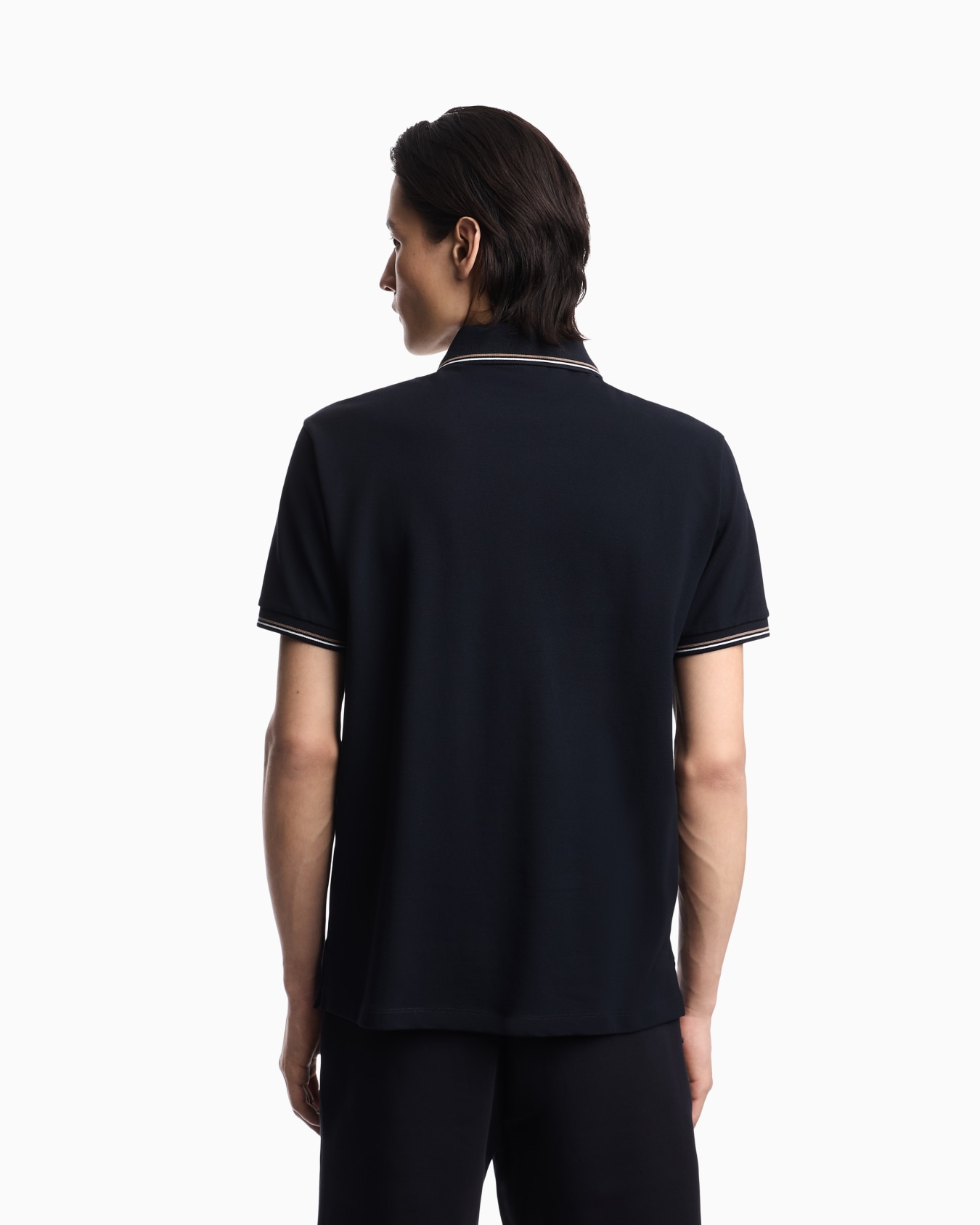 Polo slim fit de piqué elástico con microáguila Diapositiva 1