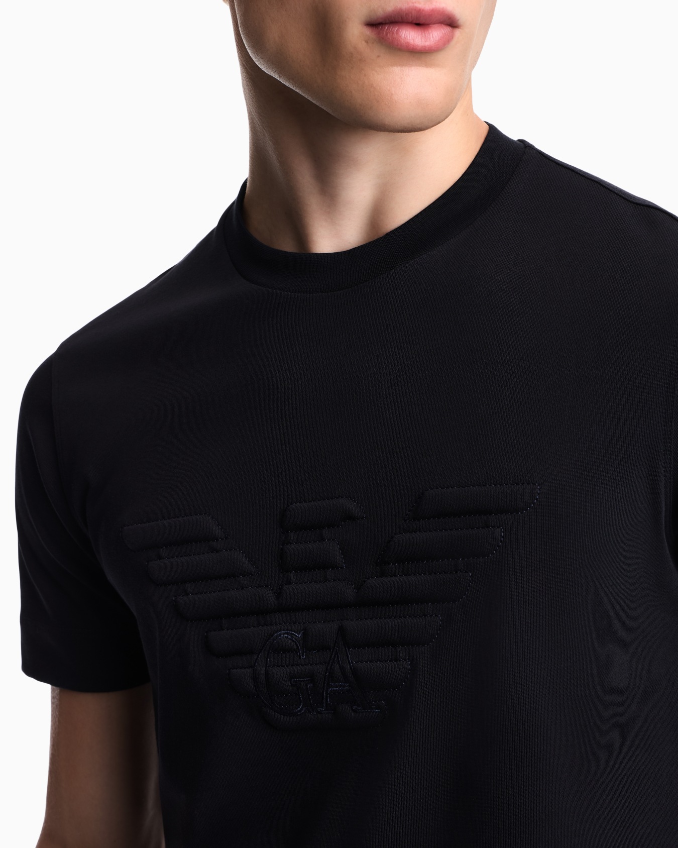 T-shirt slim fit in jersey heavy con aquila bombata Slide 7