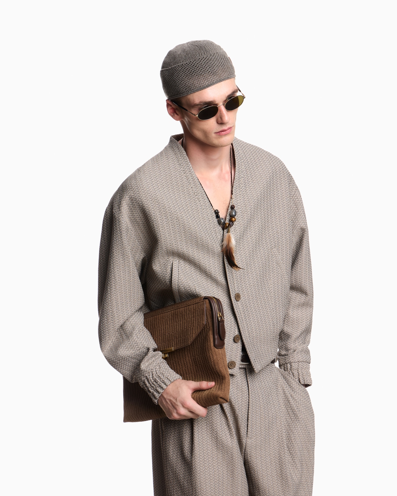 Trousers in 3D-effect micro-pattern fabric Slide 2