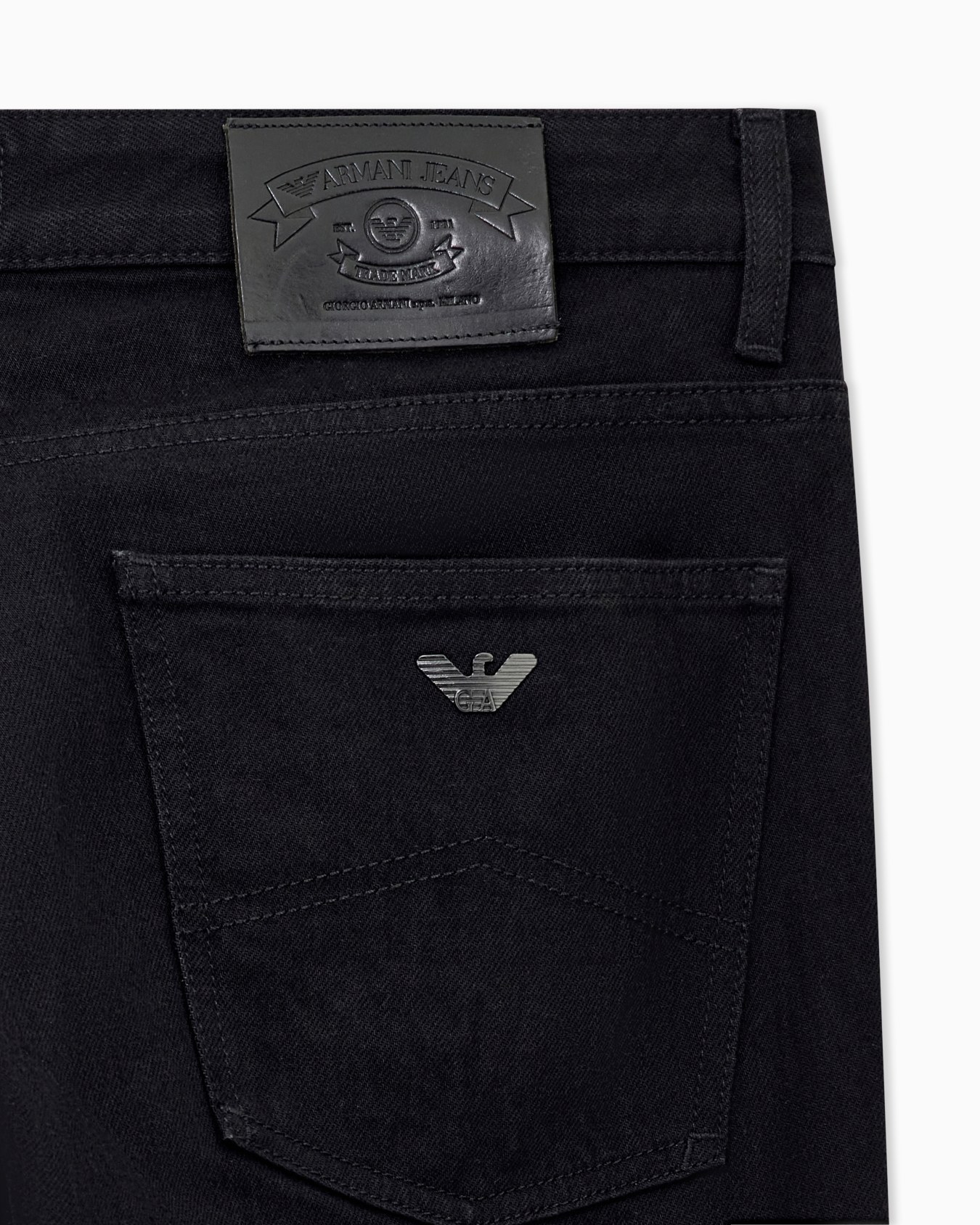 Slim fit five-pocket denim jeans with metal logo Slide 2
