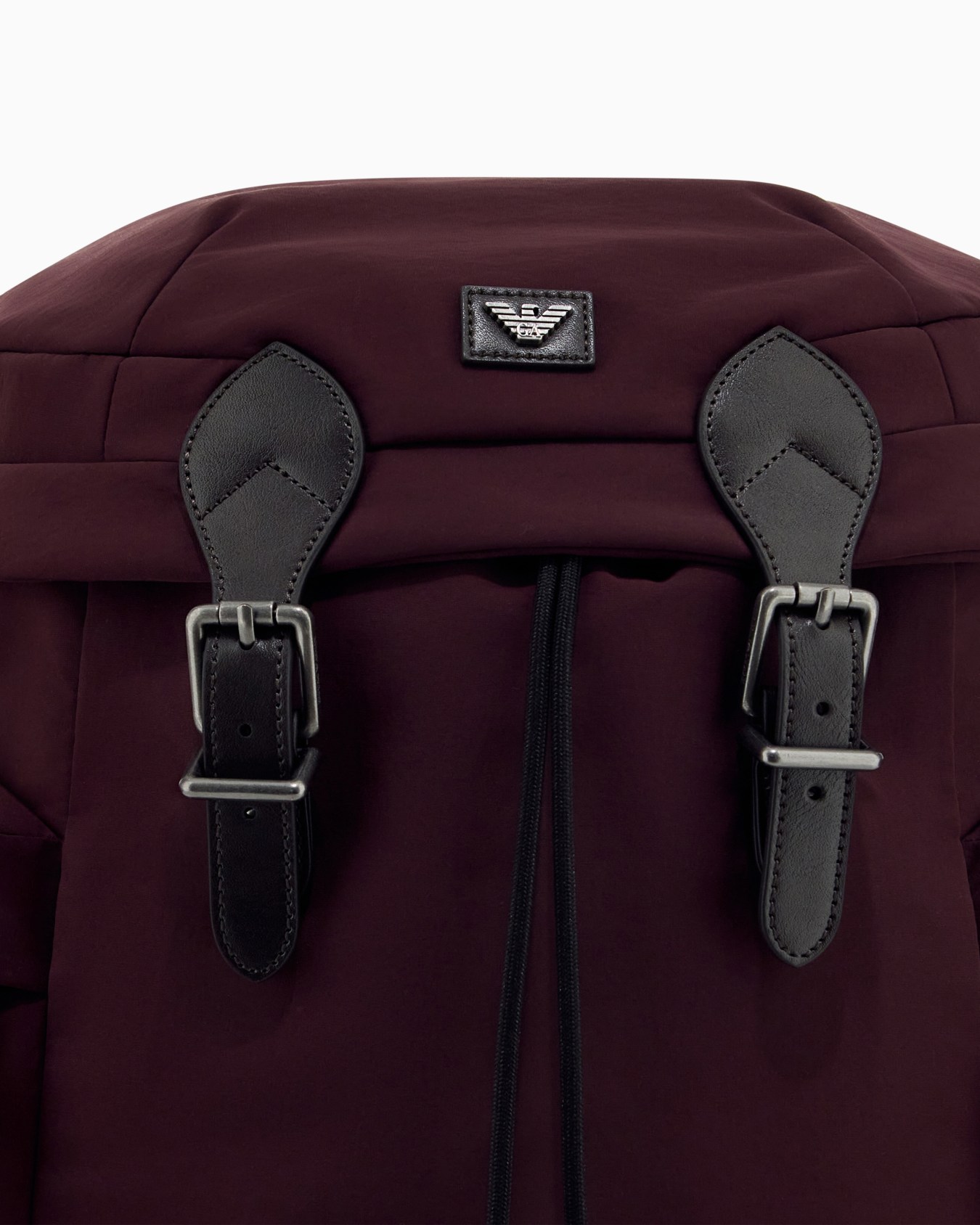 Backpack with side pockets and a top flap with metal buckles Slide 4