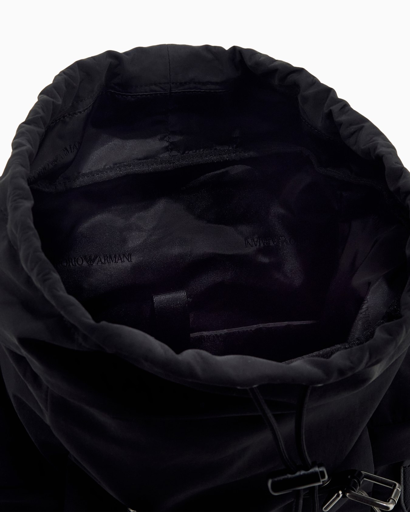 Backpack with side pockets and a top flap with metal buckles Slide 3
