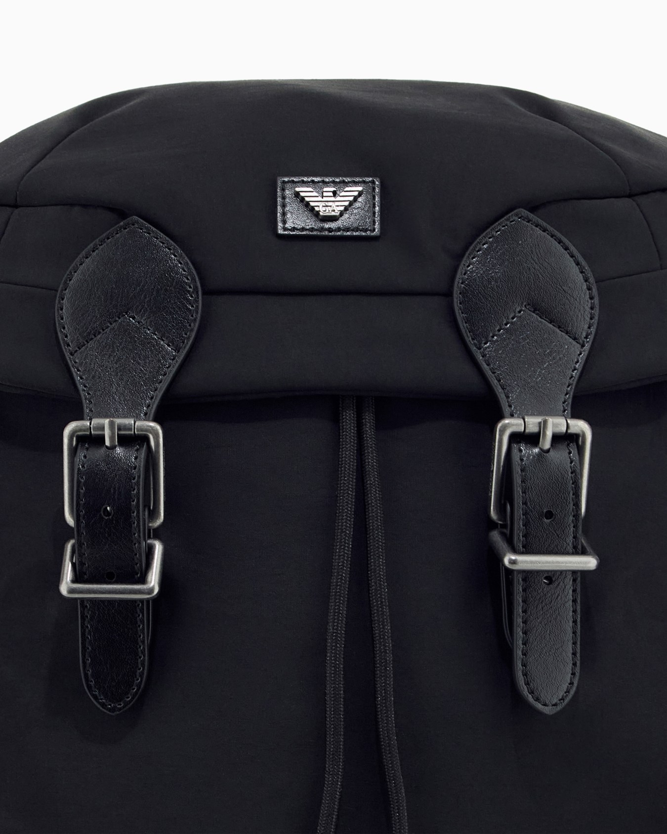 Backpack with side pockets and a top flap with metal buckles Slide 4