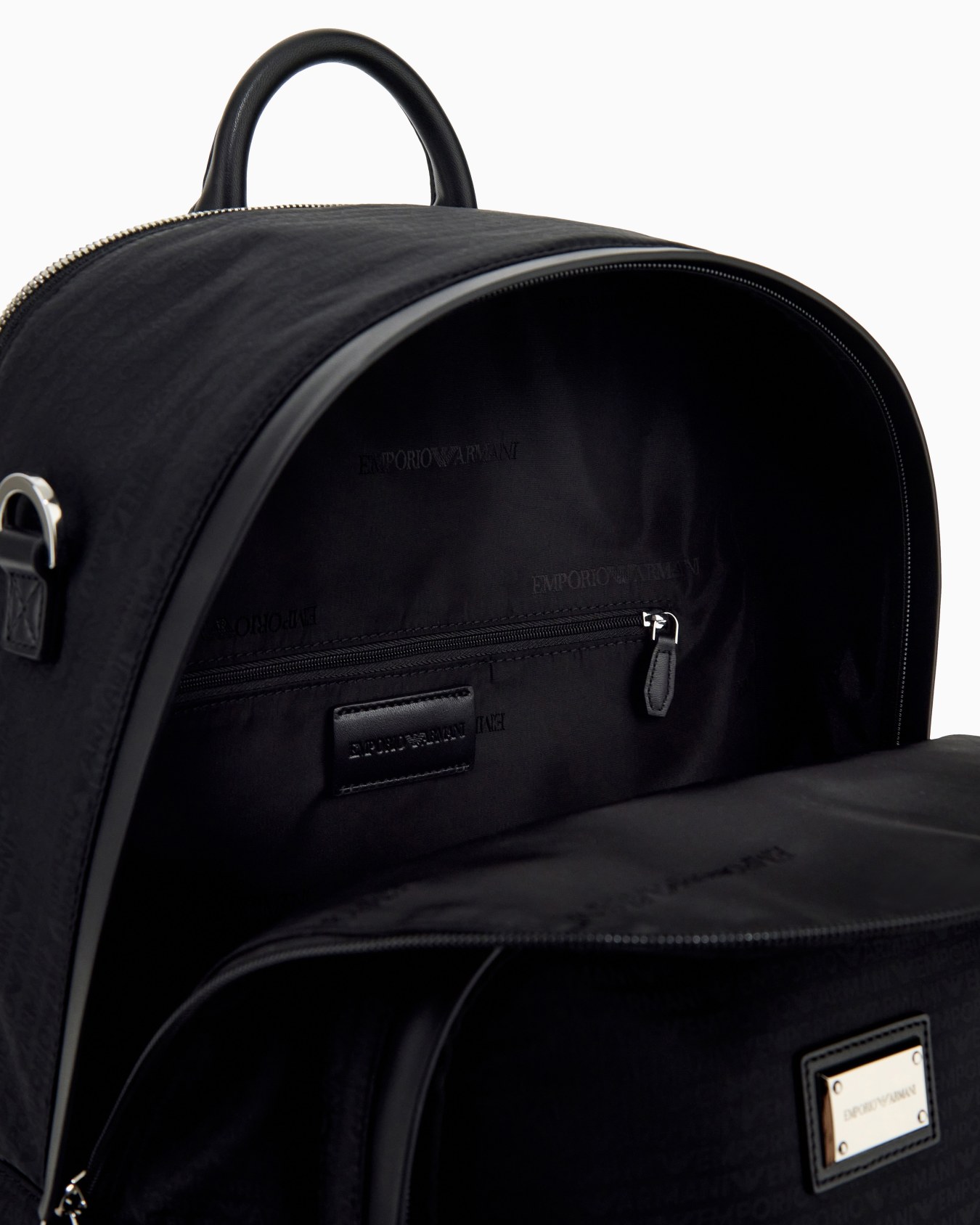Backpack with a front zip pocket and a metal logo plaque Slide 3
