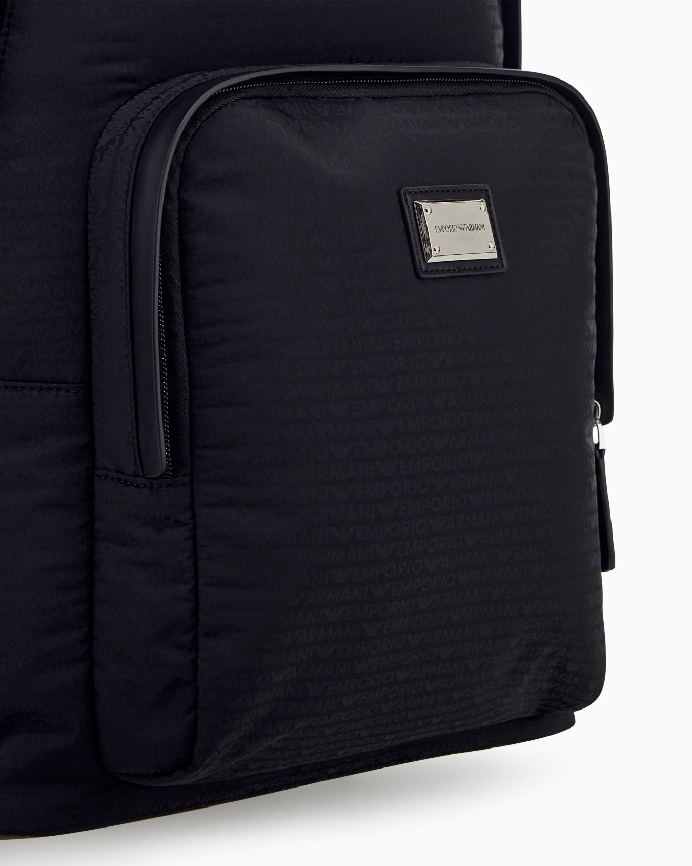 Backpack with a front zip pocket and a metal logo plaque Slide 4