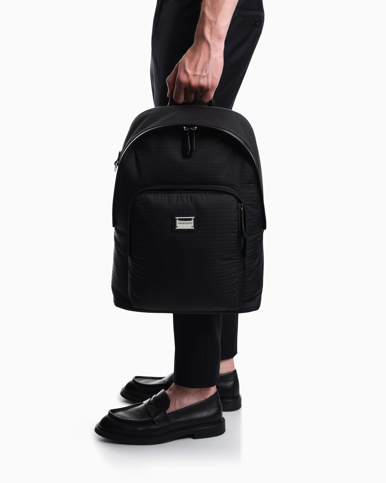 Backpack with a front zip pocket and a metal logo plaque Slide 5