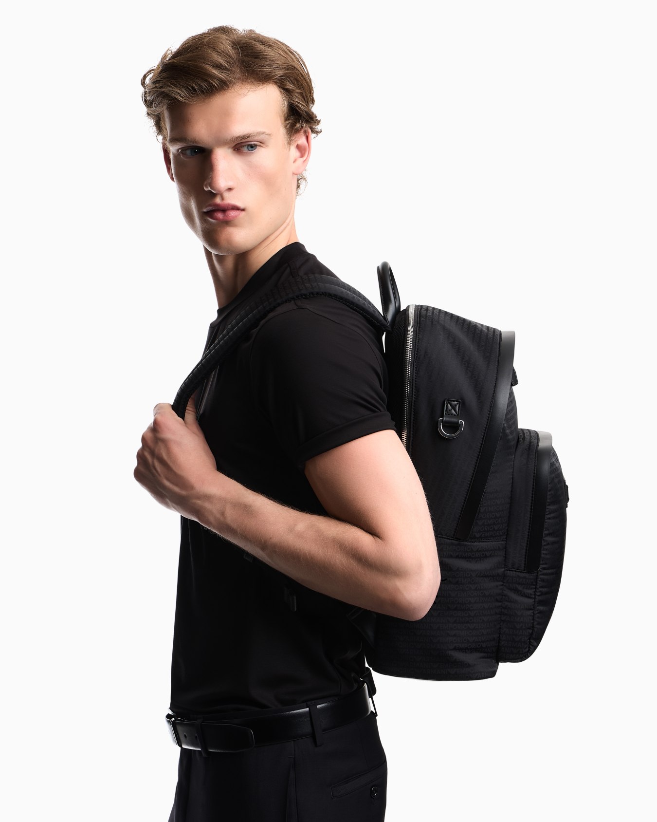Backpack with a front zip pocket and a metal logo plaque Slide 6
