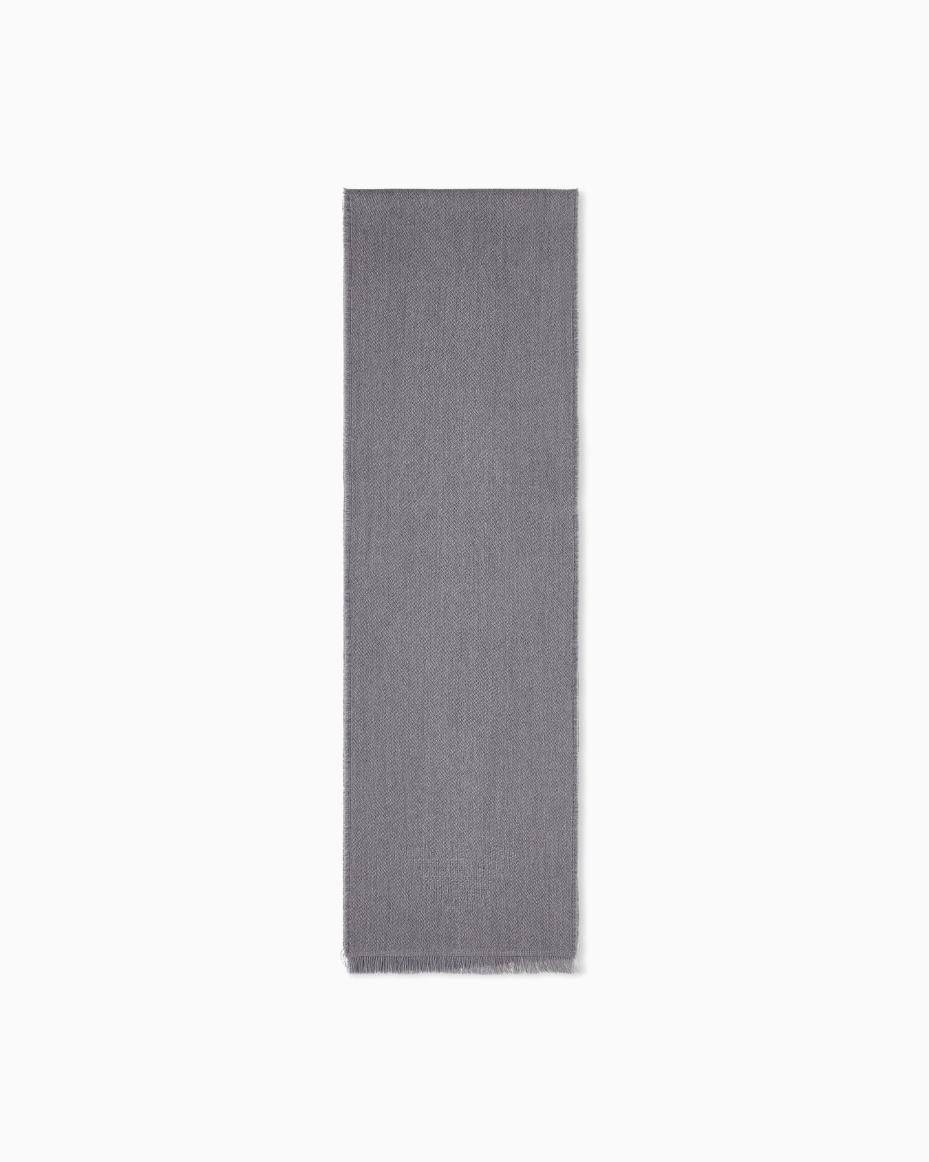 Virgin wool scarf with a woven logo and fringed edges Slide 0