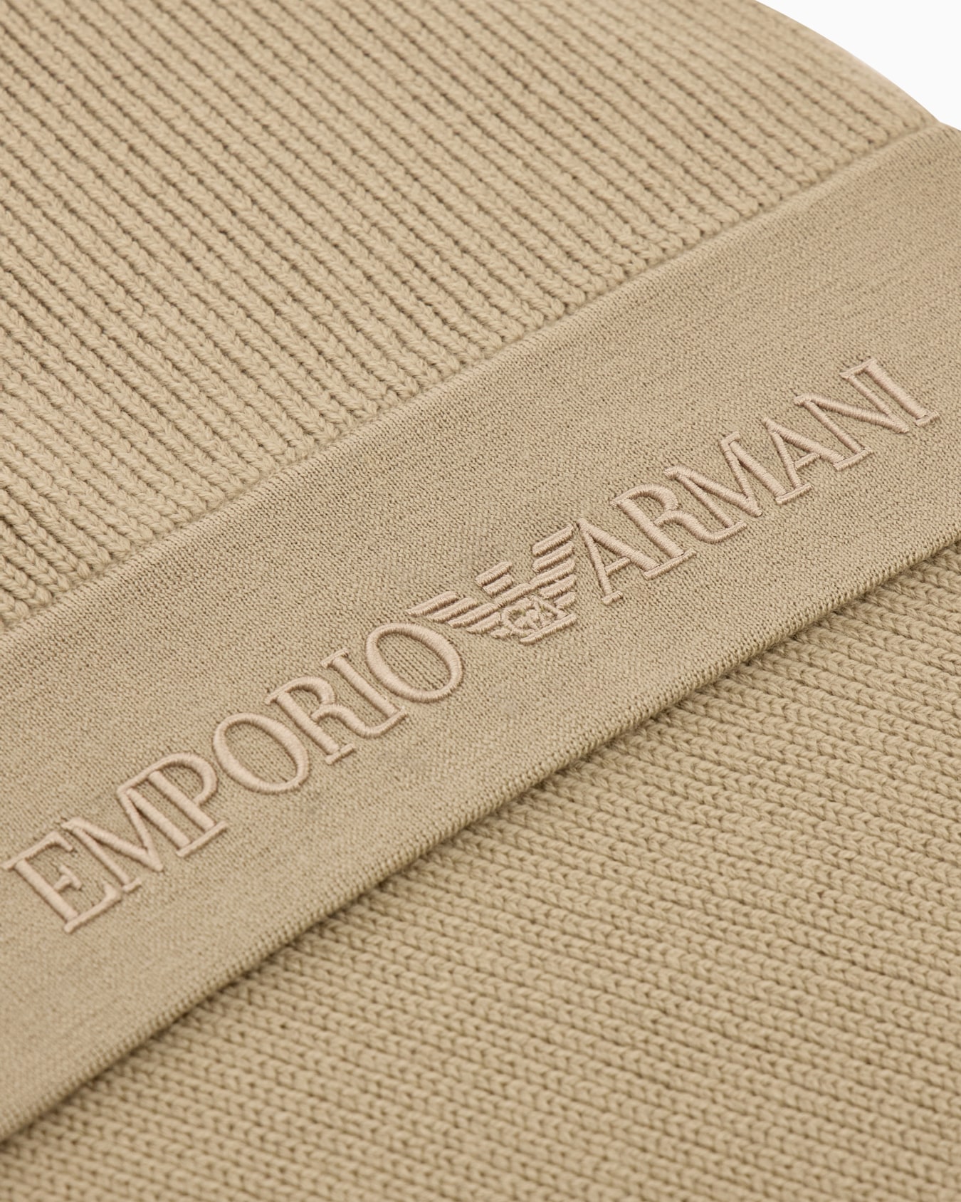Ribbed virgin wool scarf with an embossed logo Slide 1