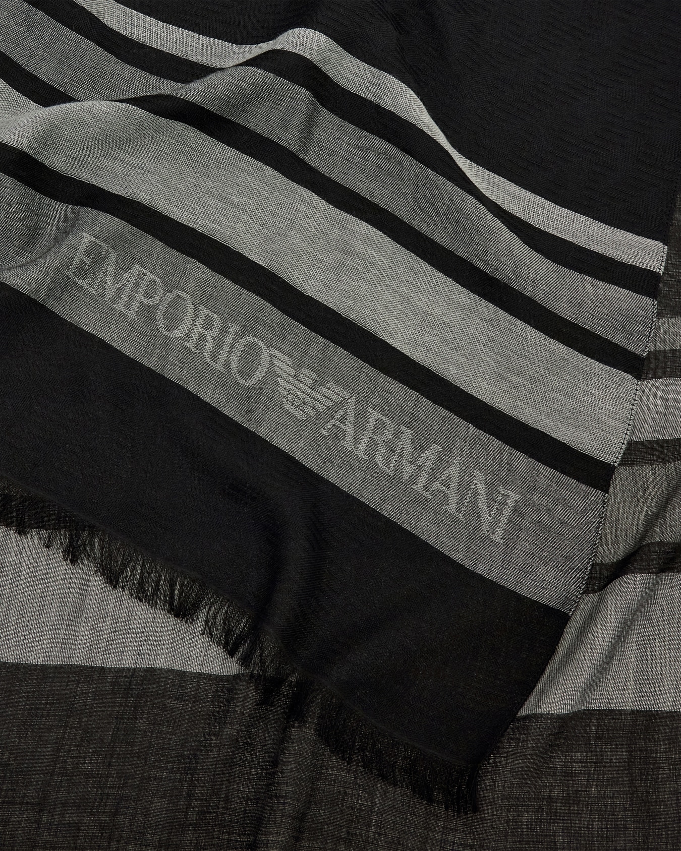Stole in striped modal and viscose with delicate fringe Slide 1