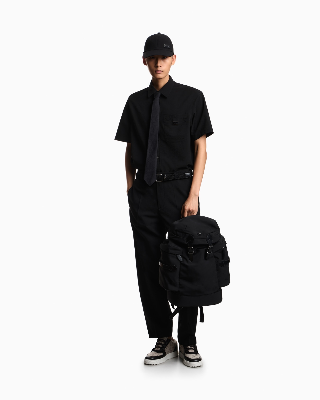 Sneakers in canvas with a logo pattern and lace-up closure Slide 6
