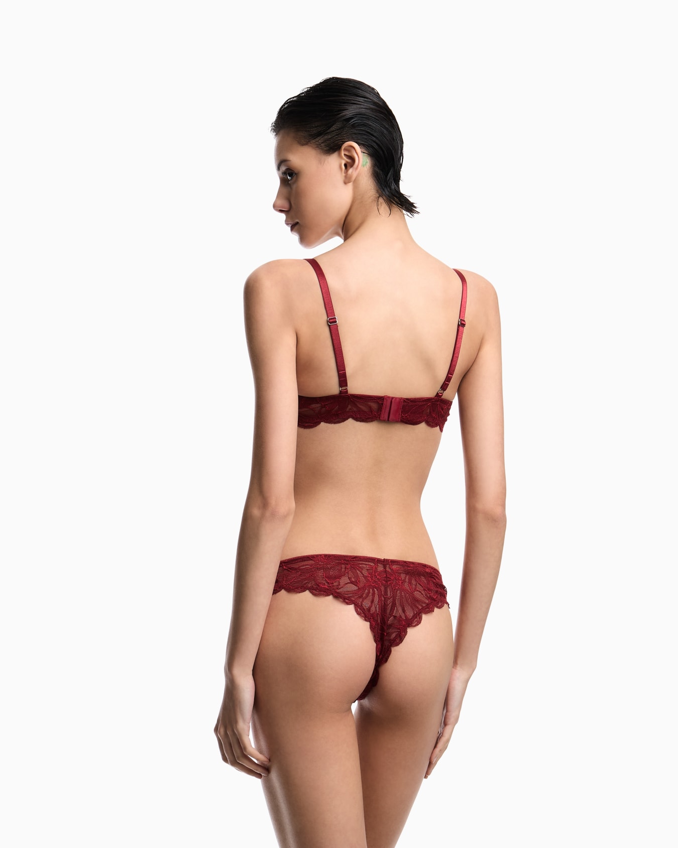 Floral lace Brazilian thong with scalloped edges and a jewel Slide 2