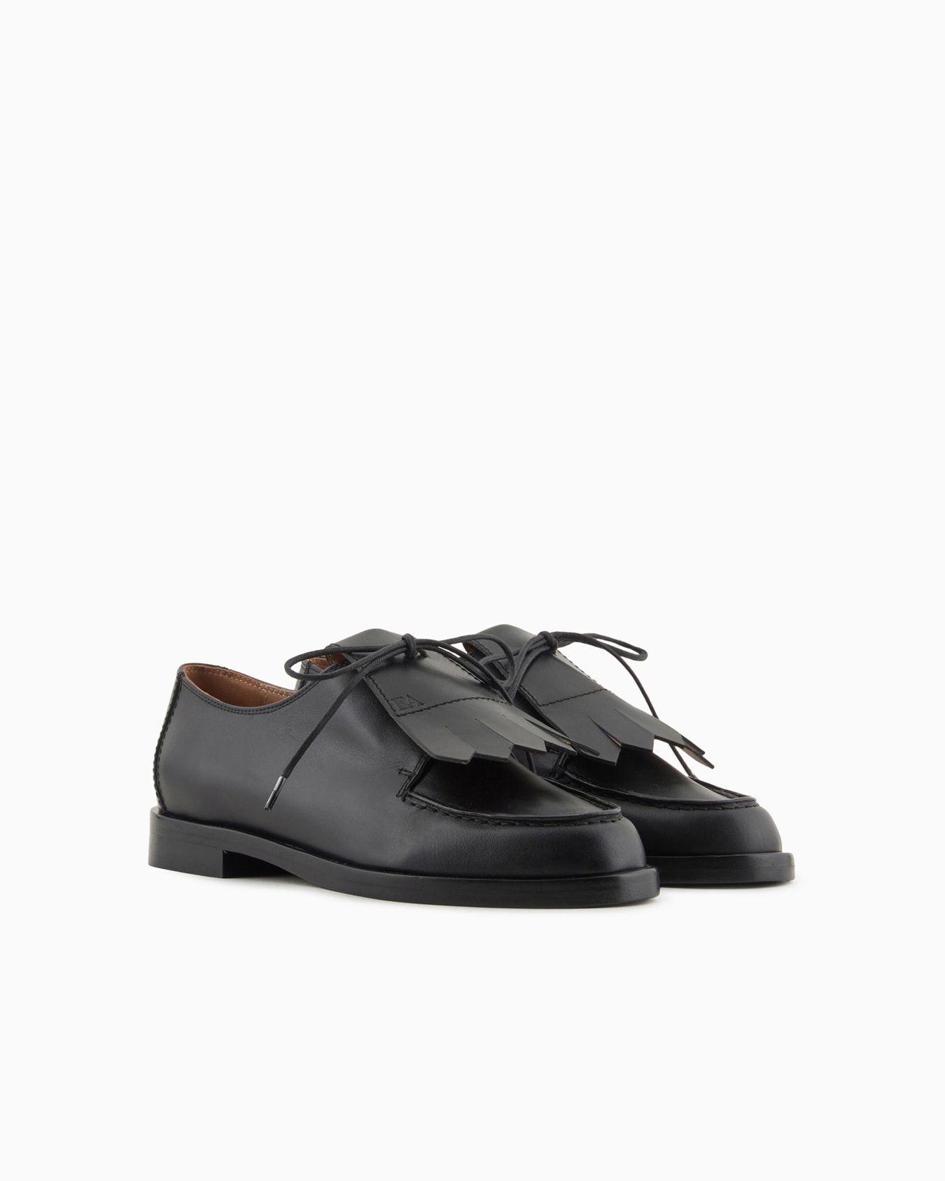 Leather lace-ups with fringes Slide 1