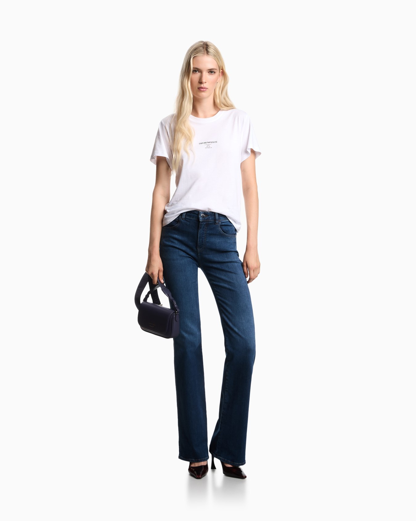 J47 Mid-high rise jeans with a flared leg in a worn-look stretch denim Slide 1