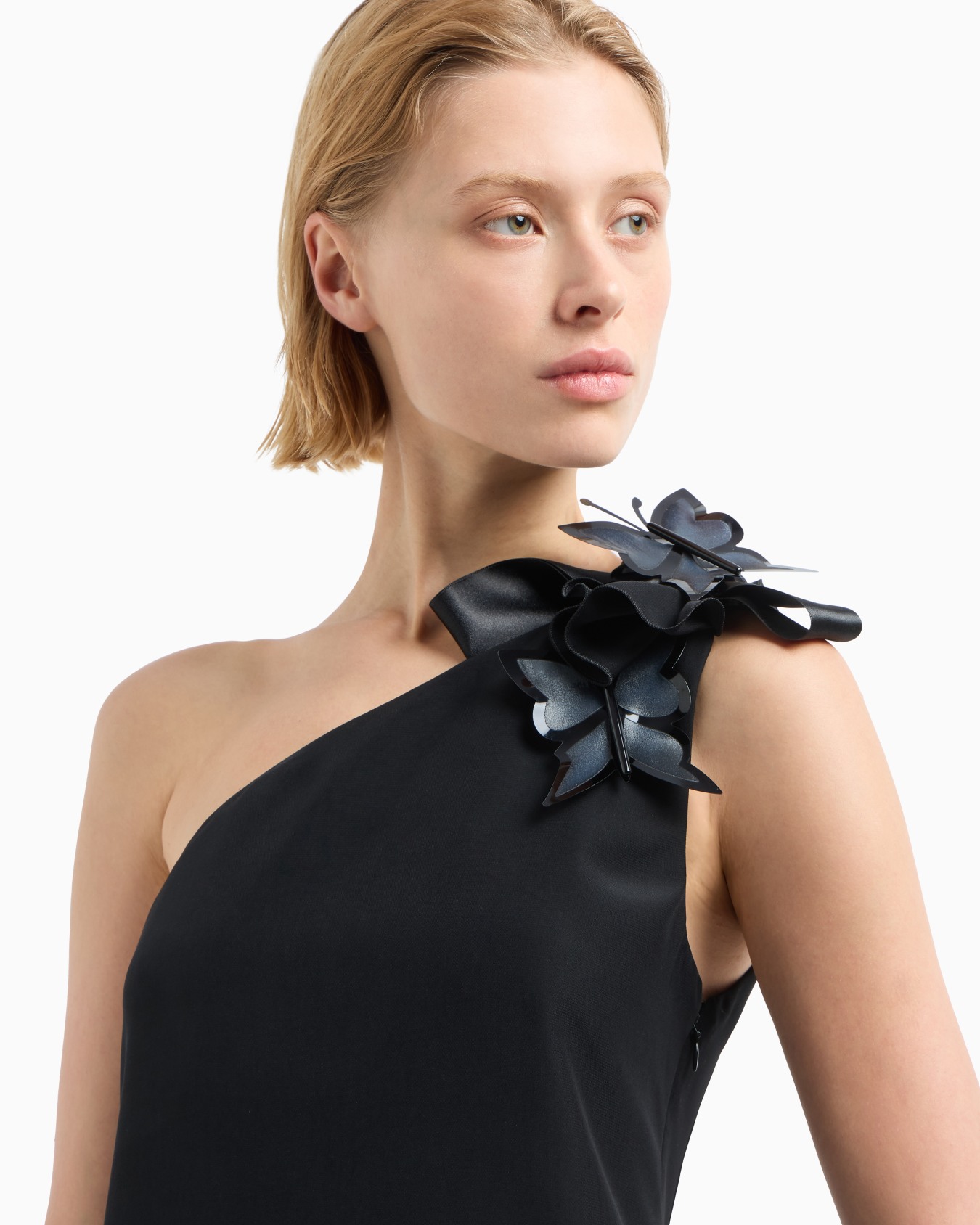 Butterfly one-shoulder dress in a fluid technical fabric with an oversized bow and brooches Slide 5
