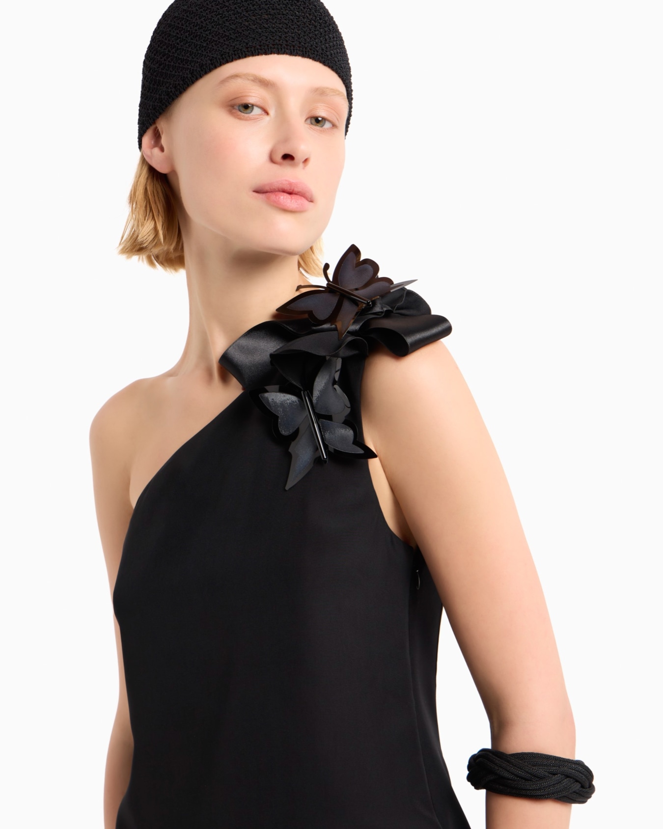 Butterfly one-shoulder dress in a fluid technical fabric with an oversized bow and brooches Slide 6
