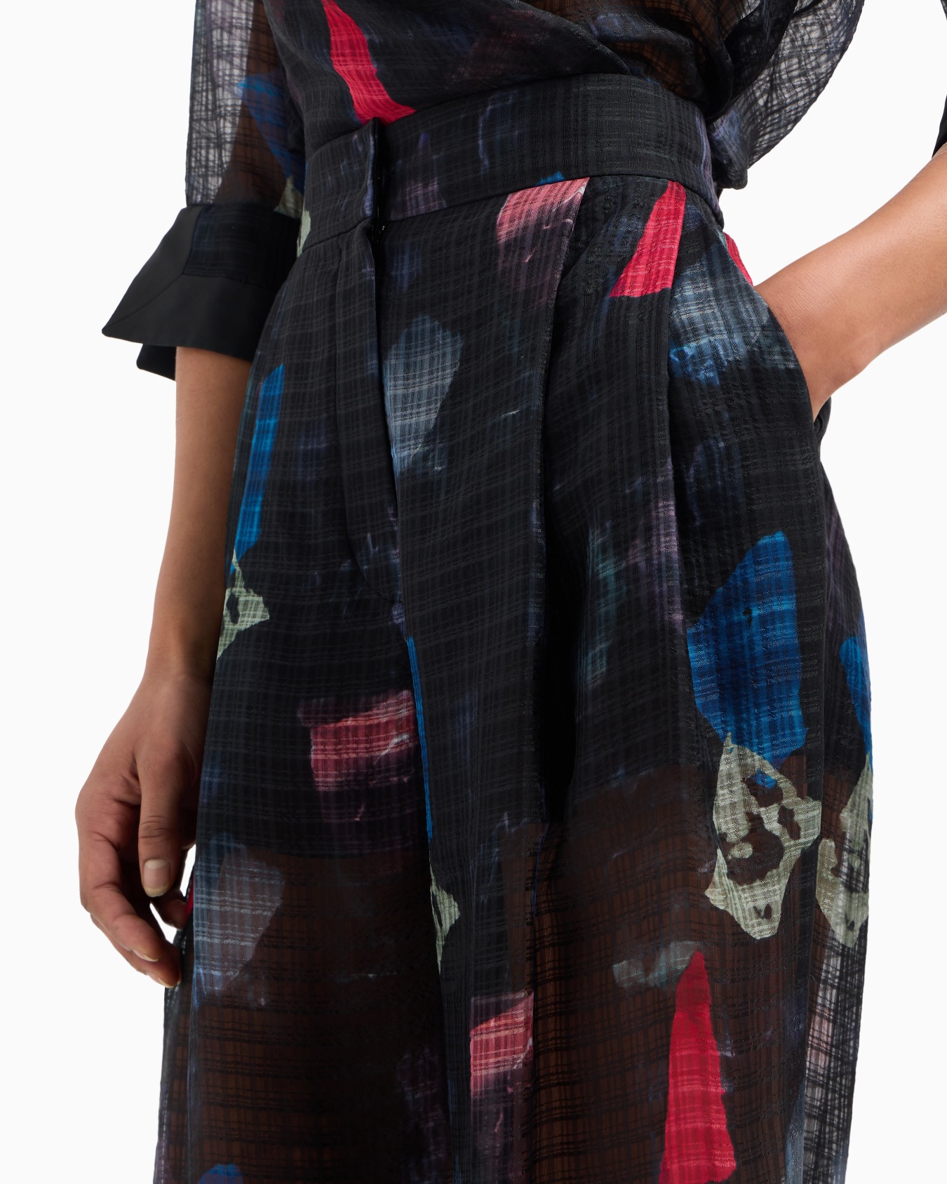 Silk trousers with pleats and micro check motif and abstract print Slide 5