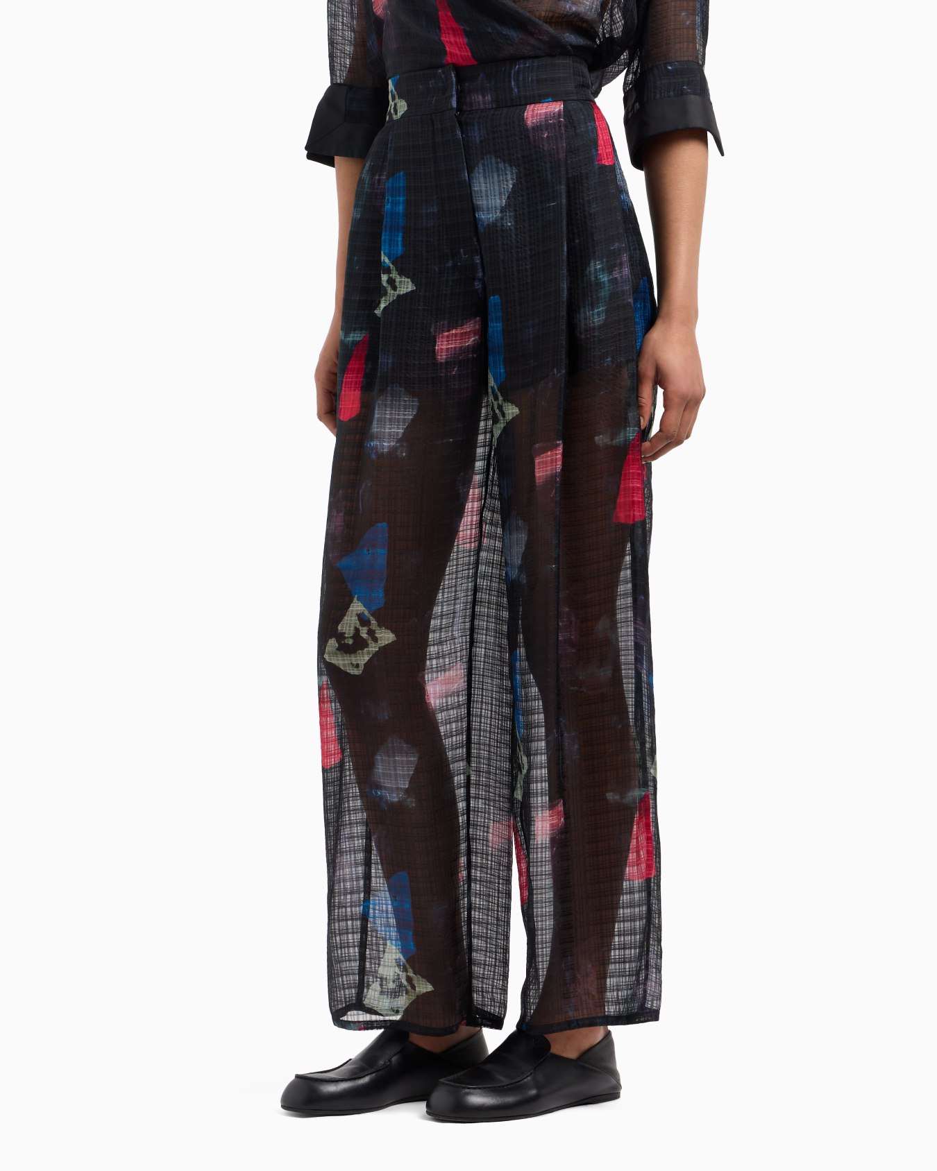 Silk trousers with pleats and micro check motif and abstract print Slide 2