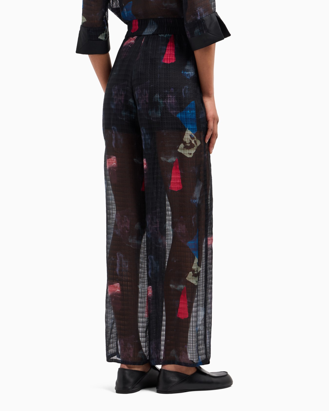 Silk trousers with pleats and micro check motif and abstract print Slide 3