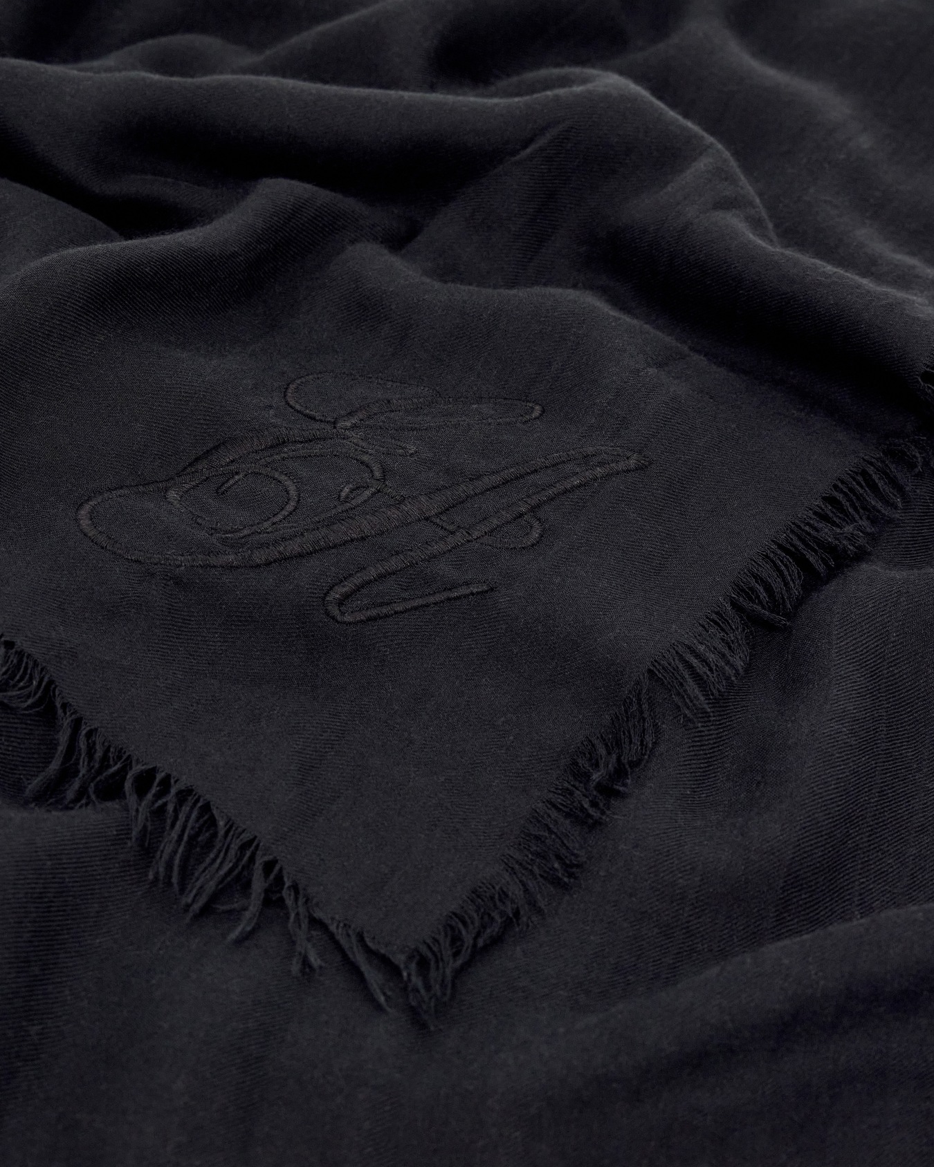 Stole in modal and cashmere with fringes and embroidery Slide 1