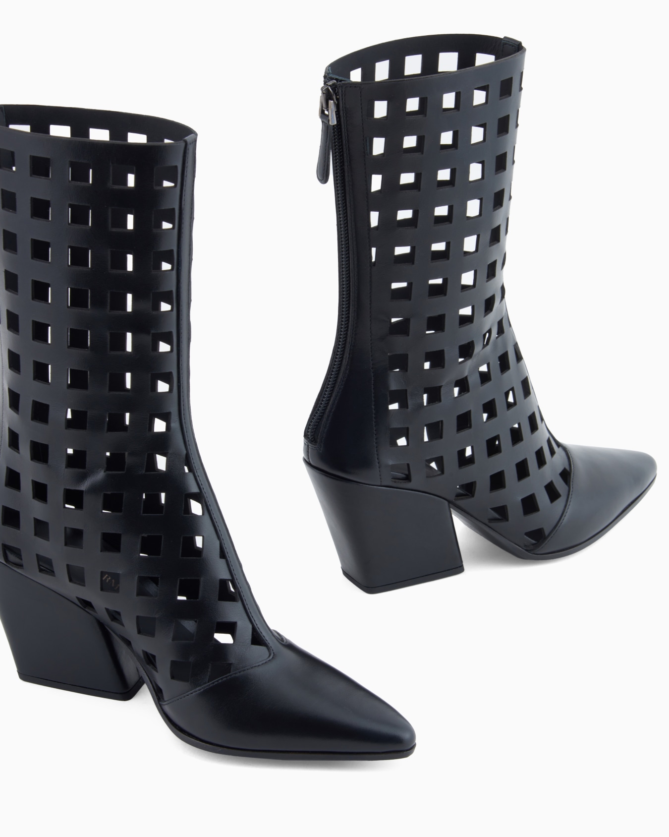 Polygon capsule collection laser-cut perforated leather ankle boots Slide 3