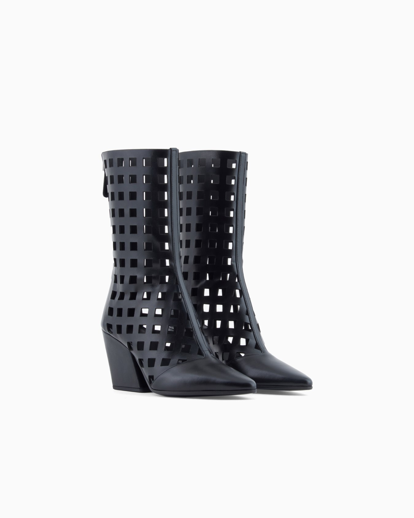 Polygon capsule collection laser-cut perforated leather ankle boots Slide 1