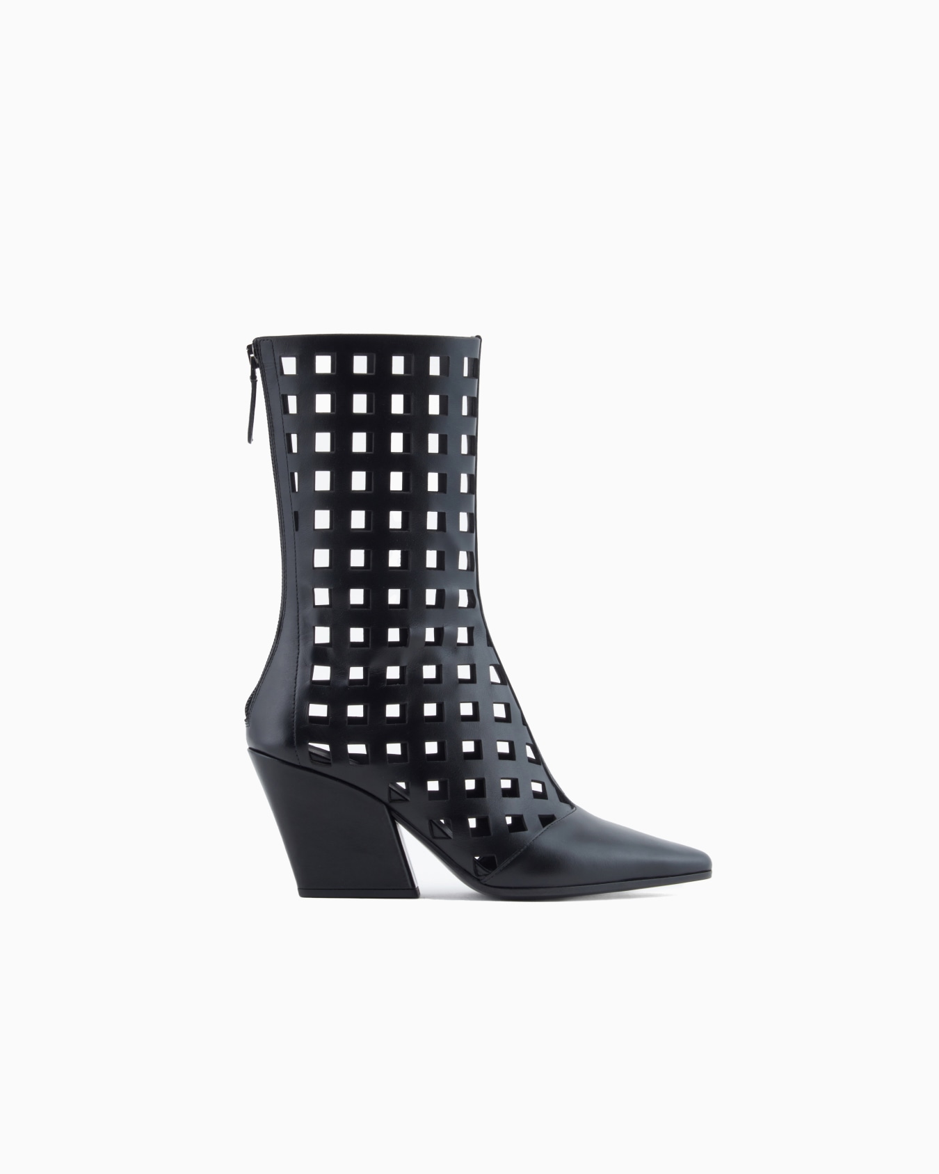 Polygon capsule collection laser-cut perforated leather ankle boots Slide 0