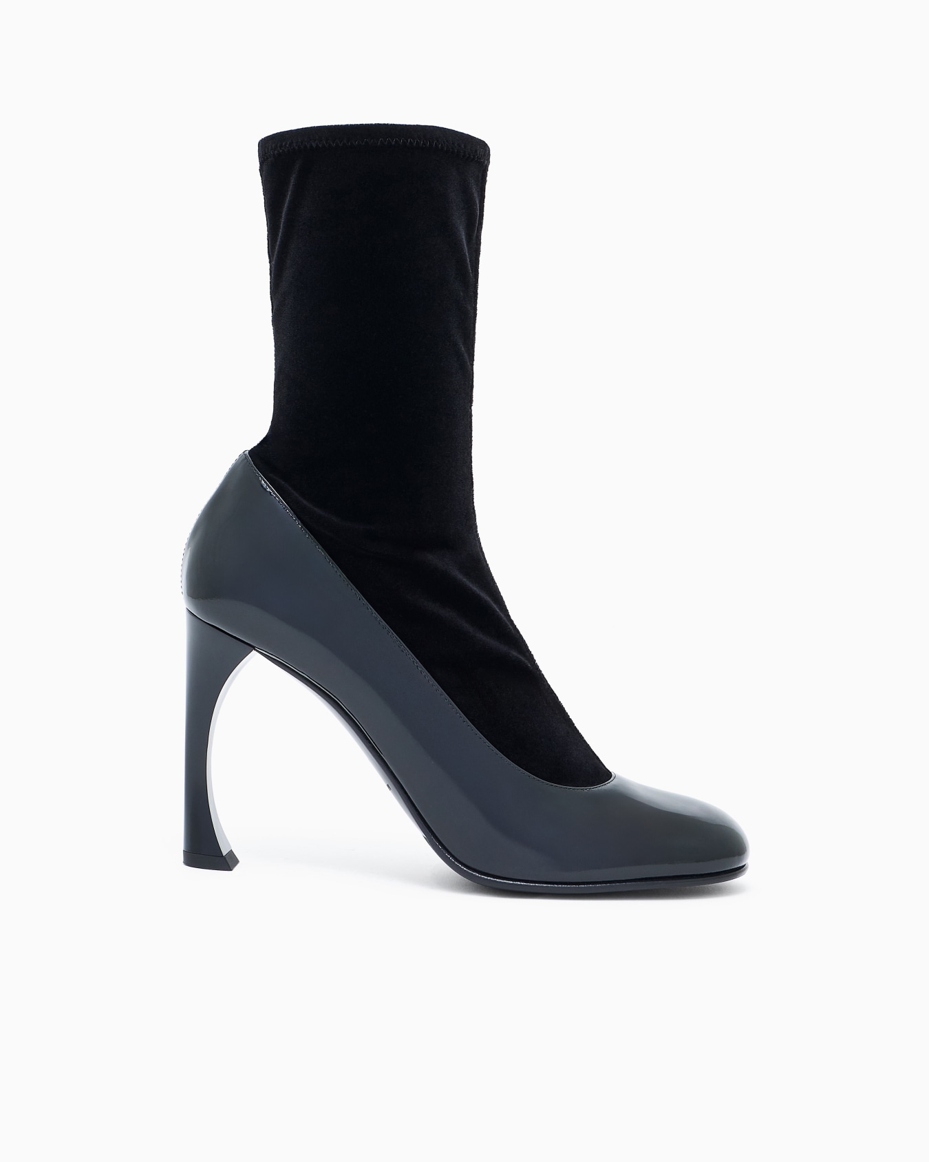Velvet and patent-leather ankle boots with a curved heel Slide 0