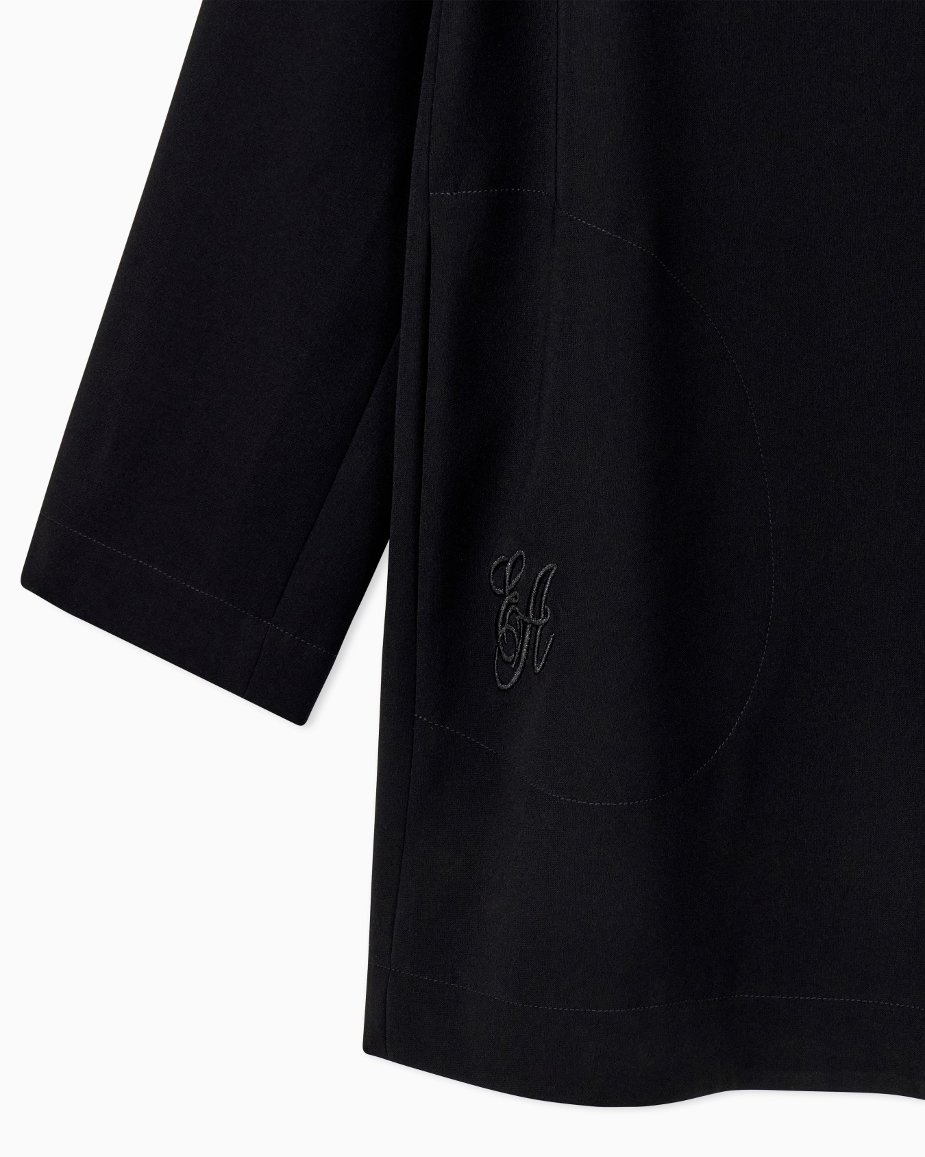 Coat in techno cady with asymmetrical flap and sleeve zips Slide 2