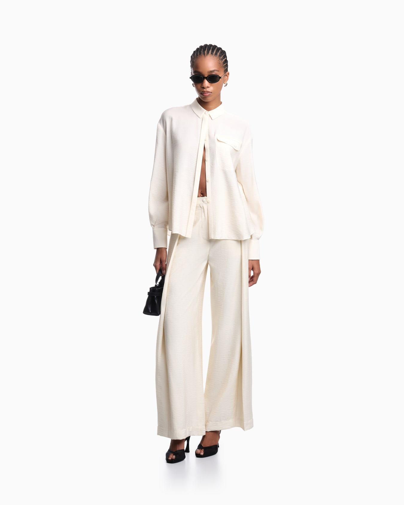 Wide-leg trousers in technical rayon Slide 1