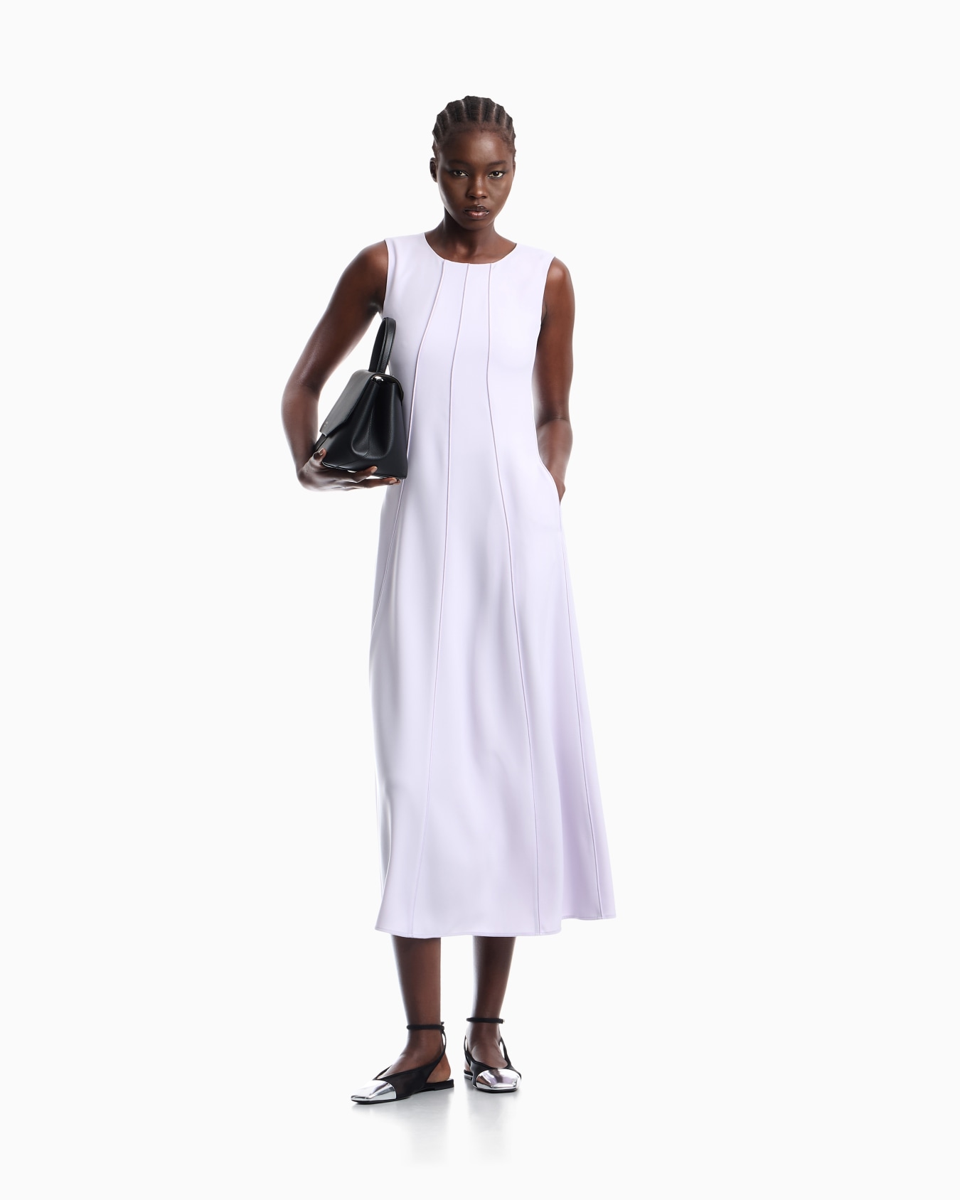 Sleeveless dress in techno cady with vertical piping Slide 1