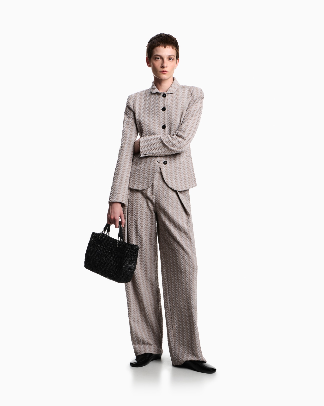 Jacquard jersey knit trousers with an embossed wave design Slide 2