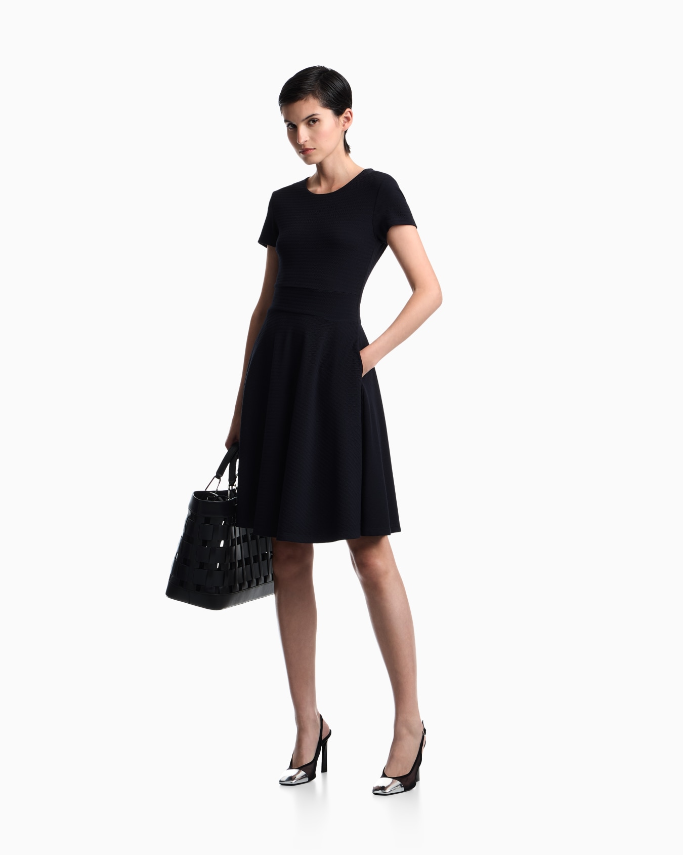 Dress in jersey jacquard with short sleeves and flared skirt Slide 1
