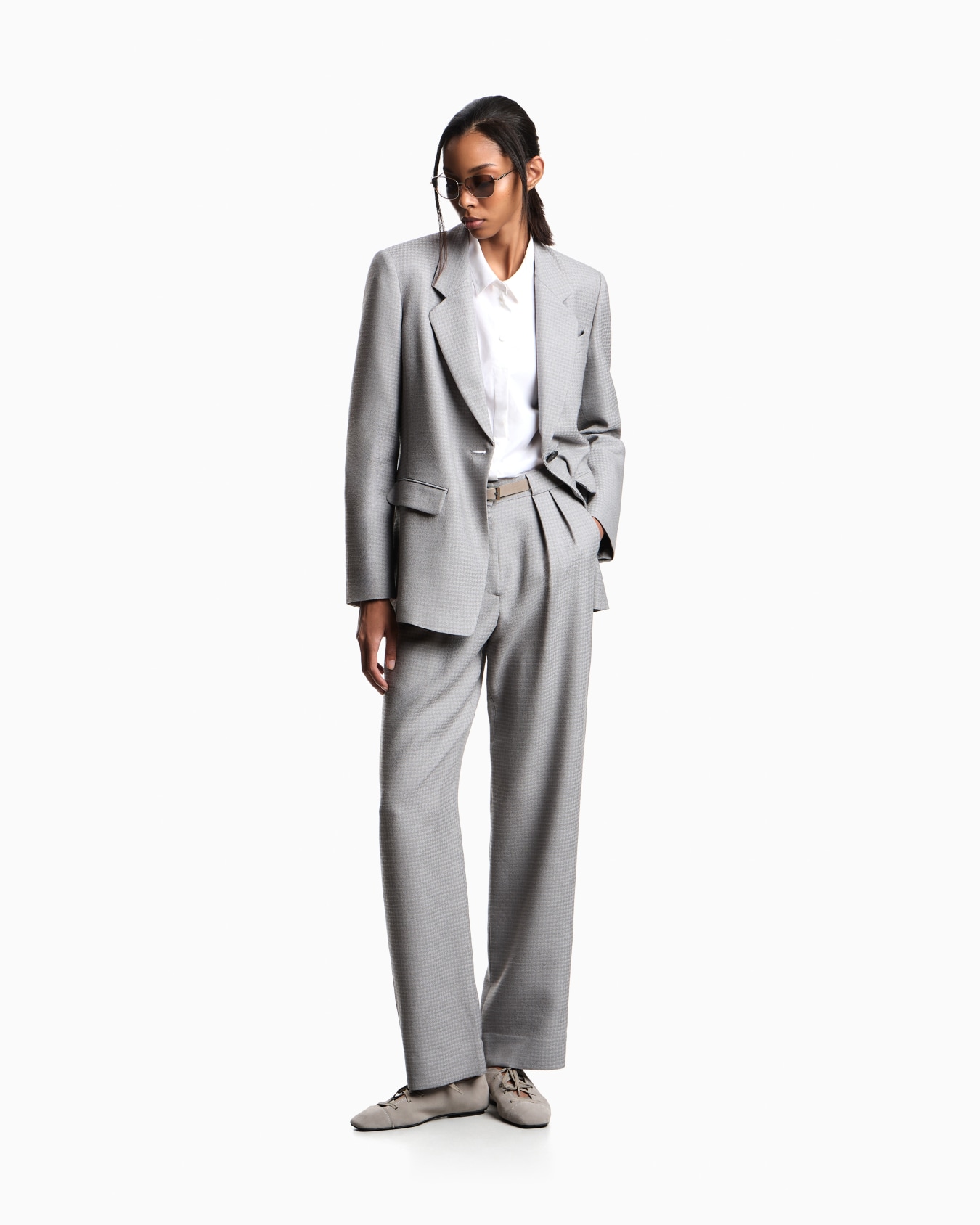 High-waisted trousers in houndstooth viscose and wool Slide 1